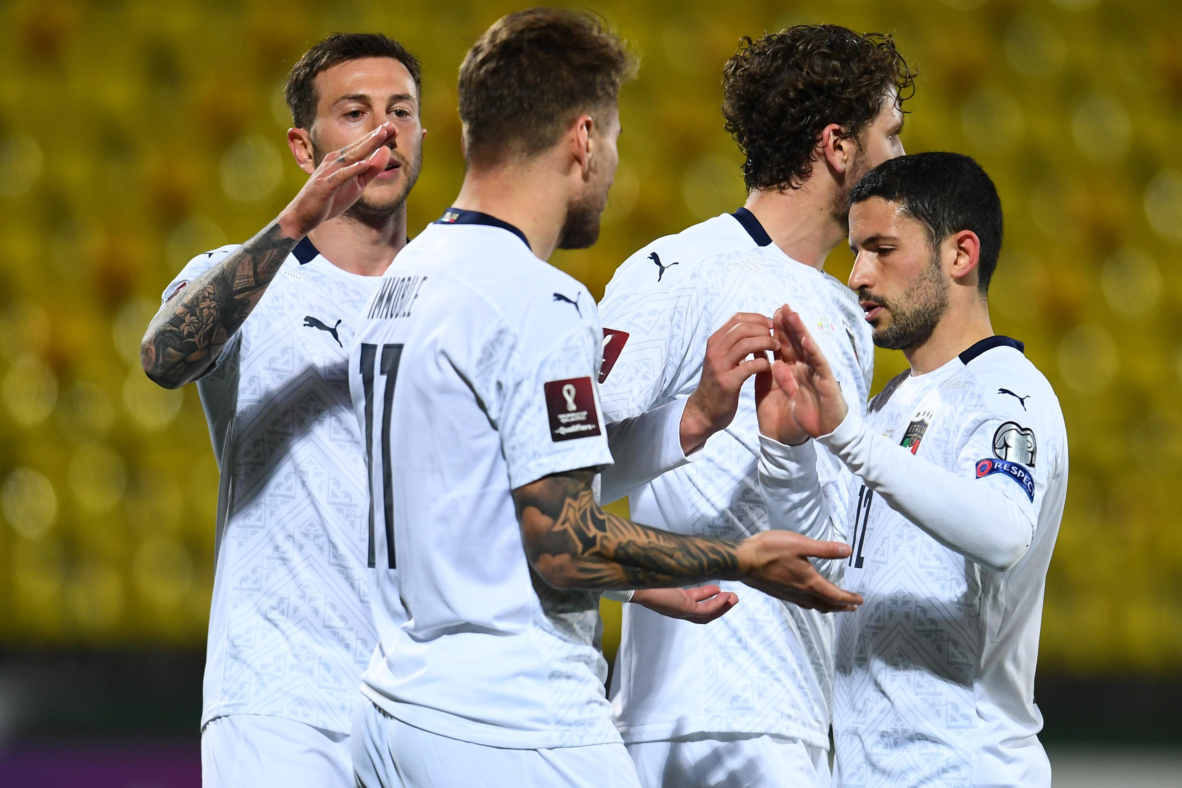 VILNIUS, LITHUANIA - MARCH 31:  Ciro Immobile of Italy celebrates with team-mates after scoring the second goal during the FIFA World Cup 2022 Qatar qualifying match between Lithuania and Italy on March 31, 2021 in Vilnius, Lithuania. (Photo by Claudio Villa/Getty Images)