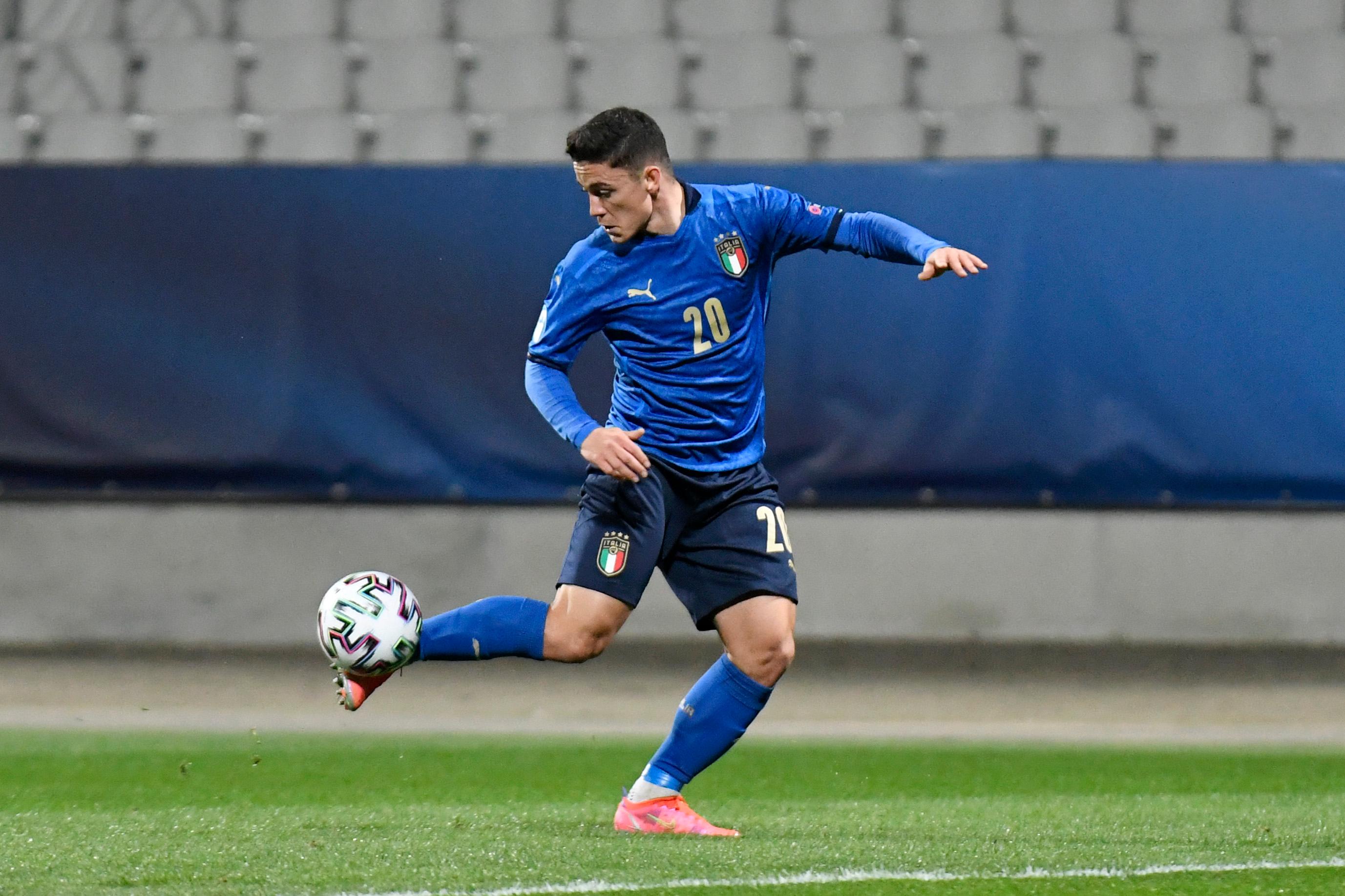 CELJE, SLOVENIA - MARCH 30: Giacomo Raspadori of Italy controls the ball before scoring their side's second goal during the 2021 UEFA European Under-21 Championship Group B match between Italy and Slovenia at Stadion Celje on March 30, 2021 in Celje, Slovenia. Sporting stadiums around Slovenia remain under strict restrictions due to the Coronavirus Pandemic as Government social distancing laws prohibit fans inside venues resulting in games being played behind closed doors. (Photo by Jurij Kodrun/Getty Images)