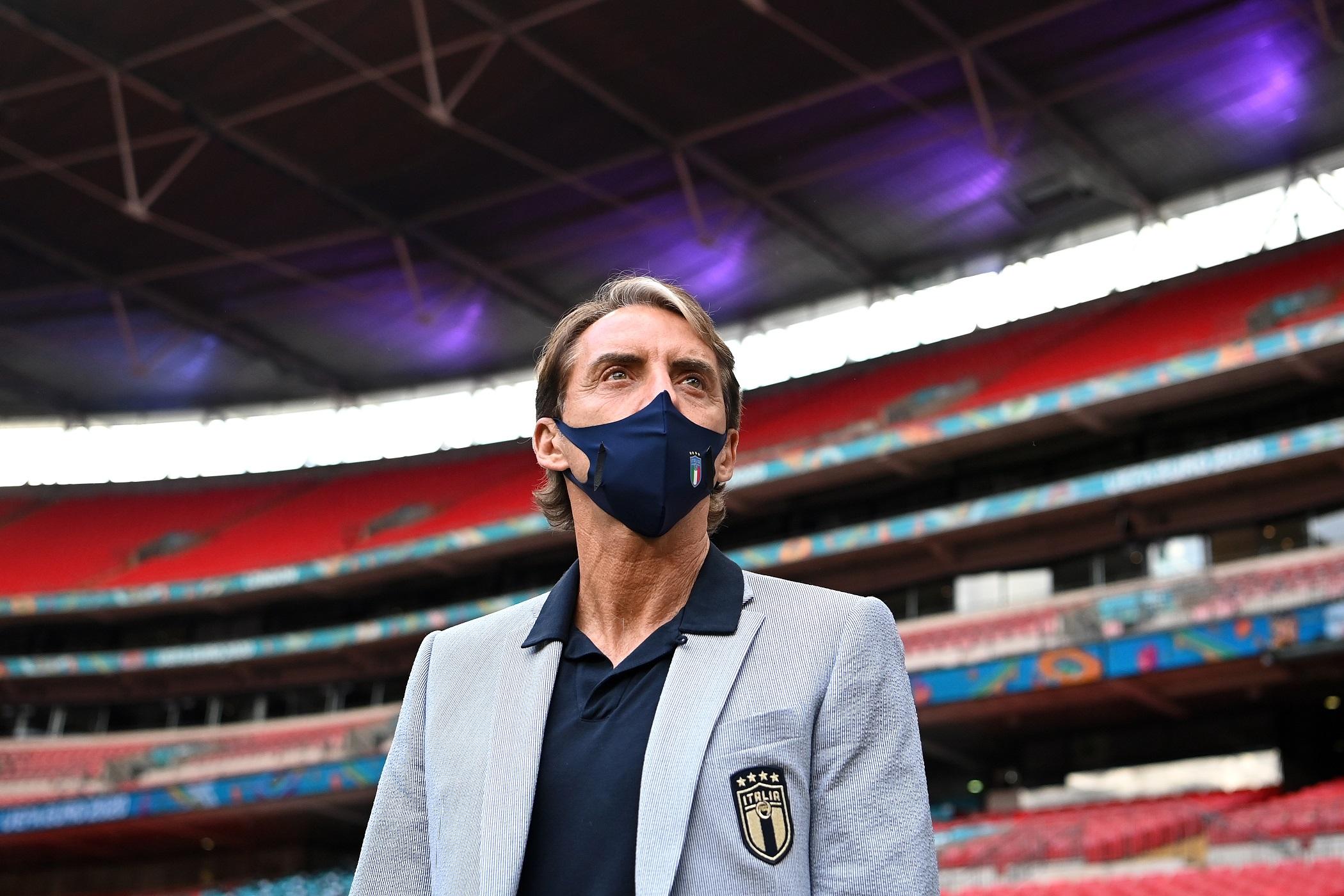 LONDON, ENGLAND - JUNE 25: Roberto Mancini, Head Coach of Italy looks on during a pitch inspection during the media activities ahead of the UEFA Euro 2020 Round of 16 match between Italy and Austria at Wembley Stadium on June 25, 2021 in London, England. (Photo by Shaun Botterill - UEFA/UEFA via Getty Images)