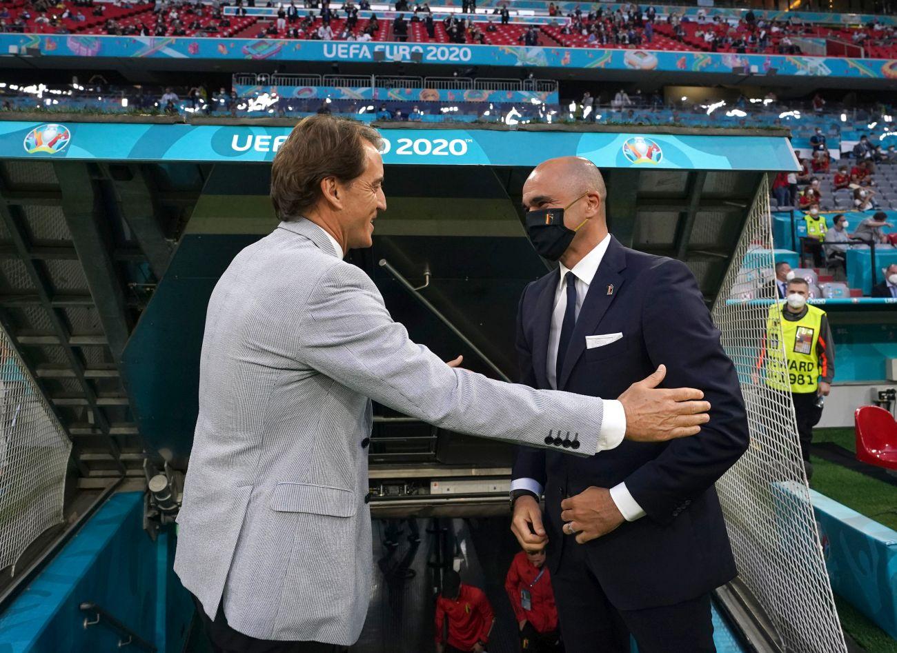 MUNICH, GERMANY - JULY 02: Head coach Italy Roberto Mancini and head coach Belgium Roberto MartÃnez attend during the UEFA Euro 2020 Championship Quarter-final match between Belgium and Italy at Football Arena Munich on July 02, 2021 in Munich, Germany. (Photo by Claudio Villa/Getty Images)