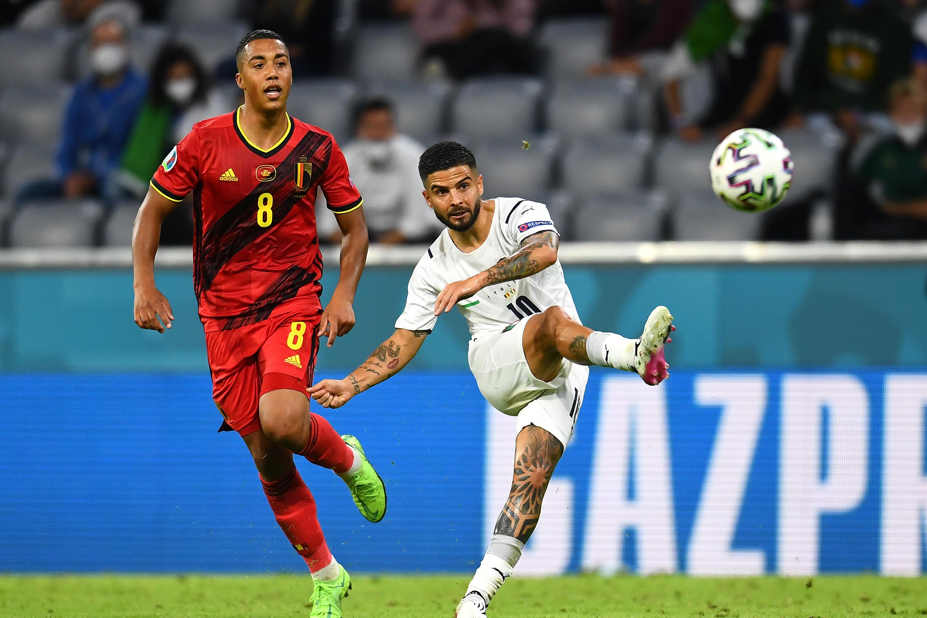 MUNICH, GERMANY - JULY 02: Lorenzo Insigne of Italy shoots whilst under pressure from Youri Tielemans of Belgium during the UEFA Euro 2020 Championship Quarter-final match between Belgium and Italy at Football Arena Munich on July 02, 2021 in Munich, Germany. (Photo by Claudio Villa/Getty Images)