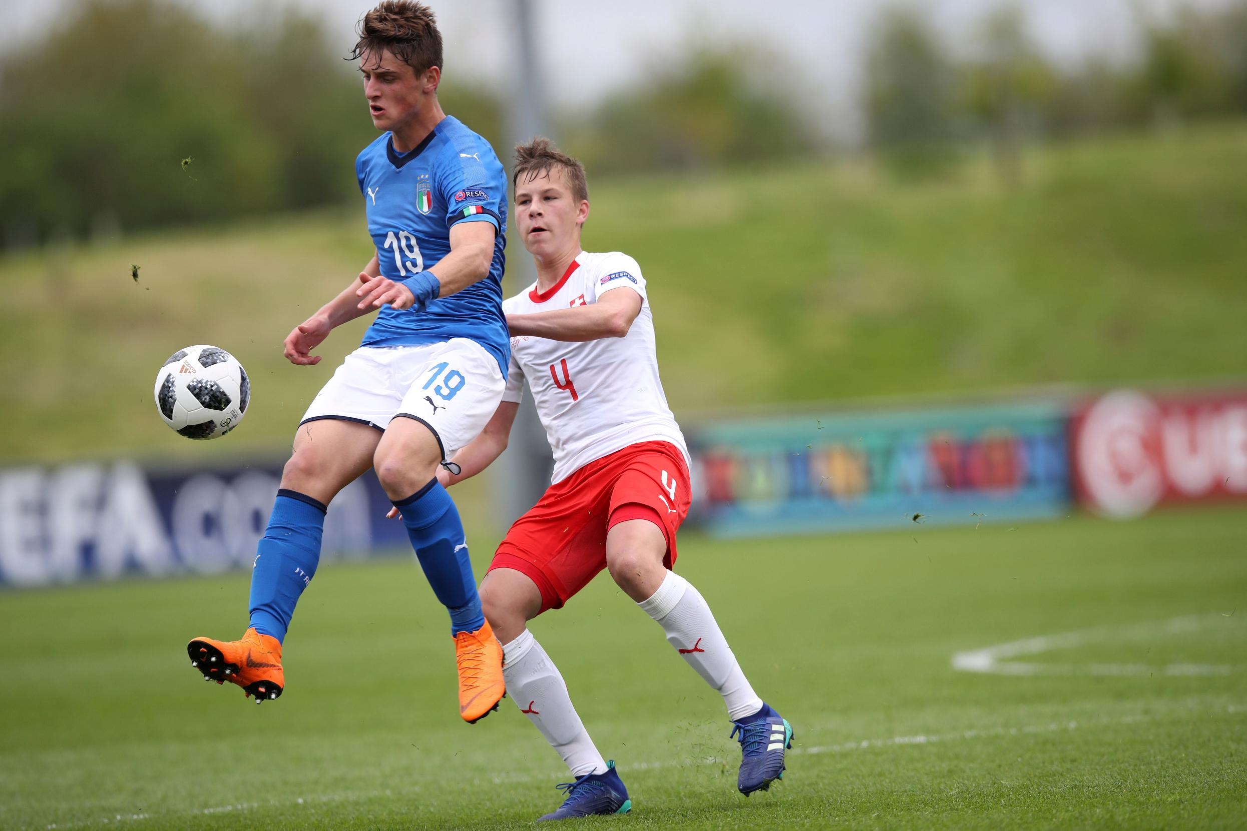 Lorenzo Colombo of Italy and Ilan Sauter  of Switzerland   during the Italy v Switzerland UEFA European Under-17 Championship 2018 Group A football match at St. George\\'s Park Stadium, Burton-on-Trent, UK on the 4th May 2018\\n\\nPhoto: Lynne Cameron for FA