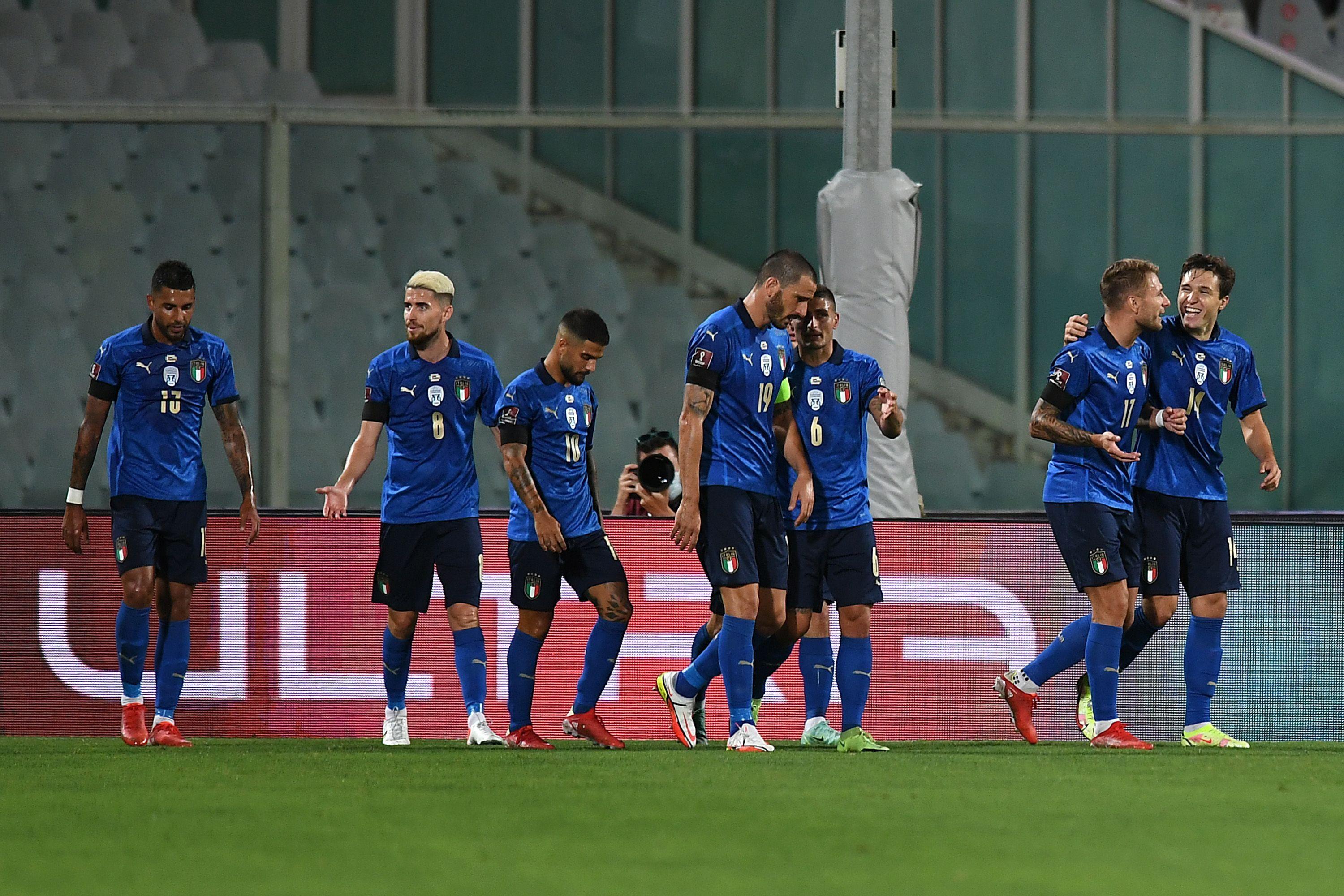 FLORENCE, ITALY - SEPTEMBER 02: Federico Chiesa of Italy  celebrates with team mates after scoring the opening goal during the 2022 FIFA World Cup Qualifier match between Italy and Bulgaria at Artemio Franchi on September 02, 2021 in Florence, . (Photo by Alessandro Sabattini/Getty Images)