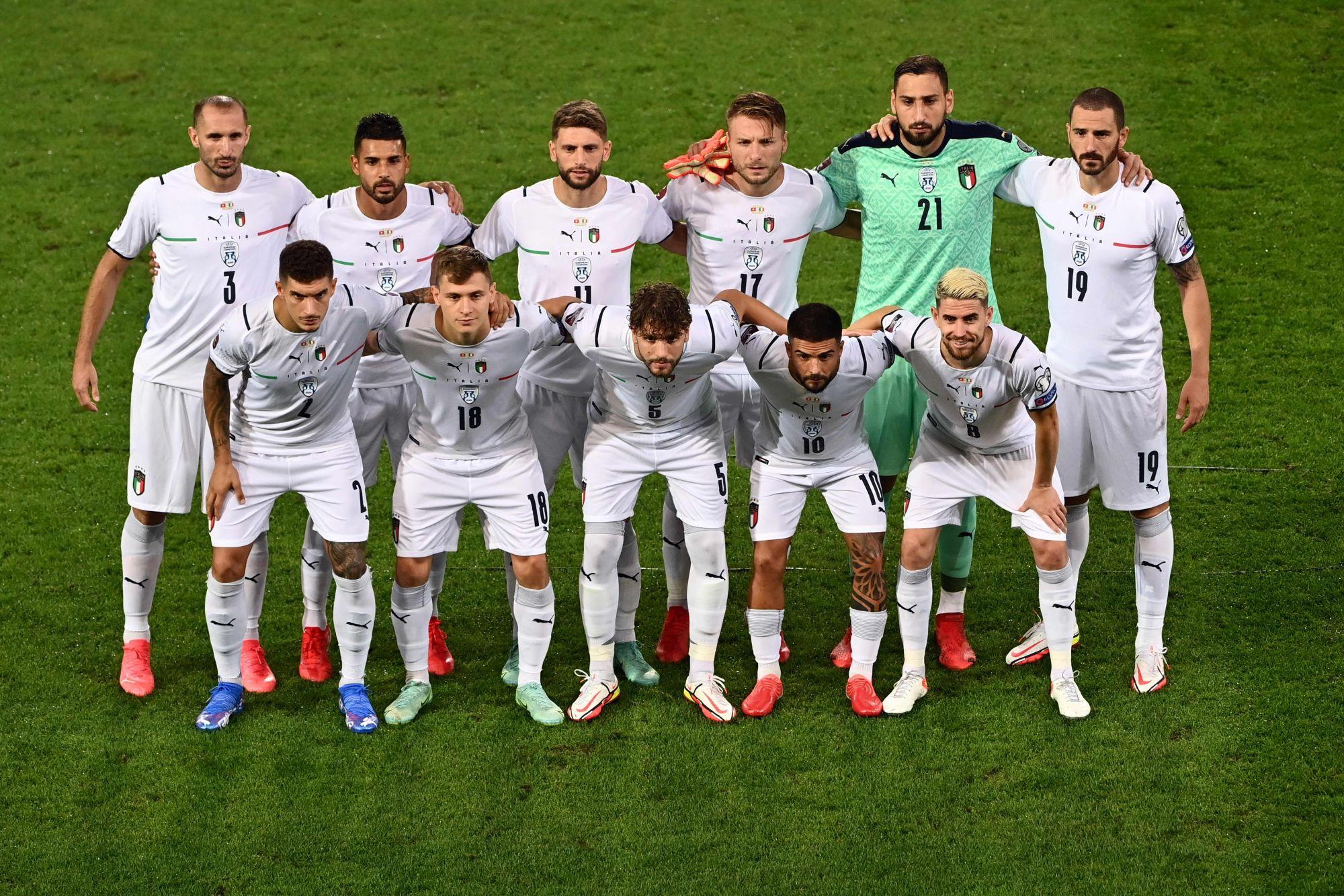 Italian players line up ahead of the World Cup 2022 qualifier football match between Switzerland and Italy, on September 5, 2021 at St Jakob-Park stadium in Basel. (Photo by Fabrice COFFRINI / AFP) (Photo by FABRICE COFFRINI/AFP via Getty Images)