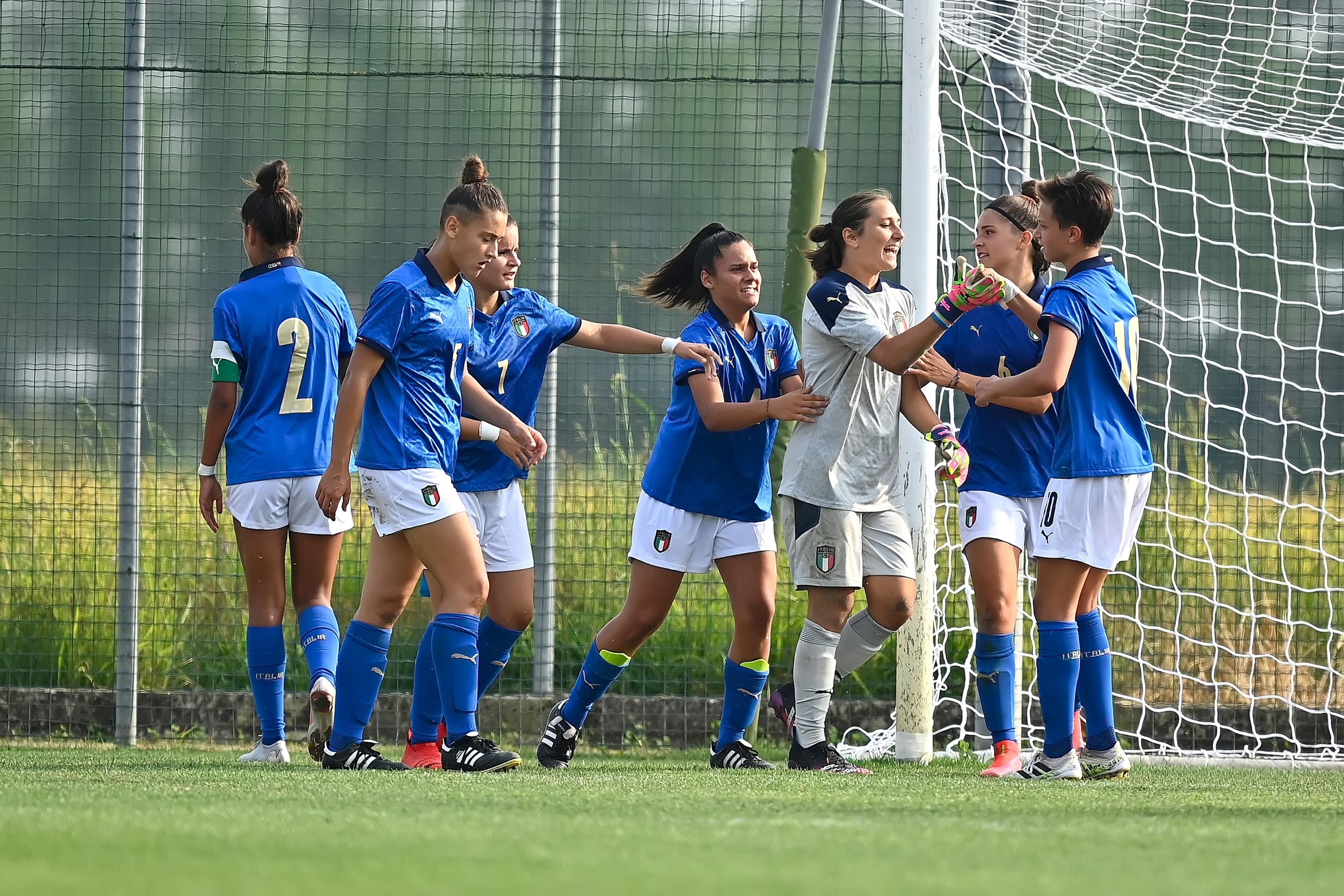 NOVARA, ITALY - SEPTEMBER 08: Giulia Zaghini of Italy U17 Women embraces her teammate during the International Friendly match between Italy U17 Women v Switzerland U17 Women at Novarello Training Center on September 08, 2021 in Novara, Italy. (Photo by Mattia Ozbot/Getty Images)