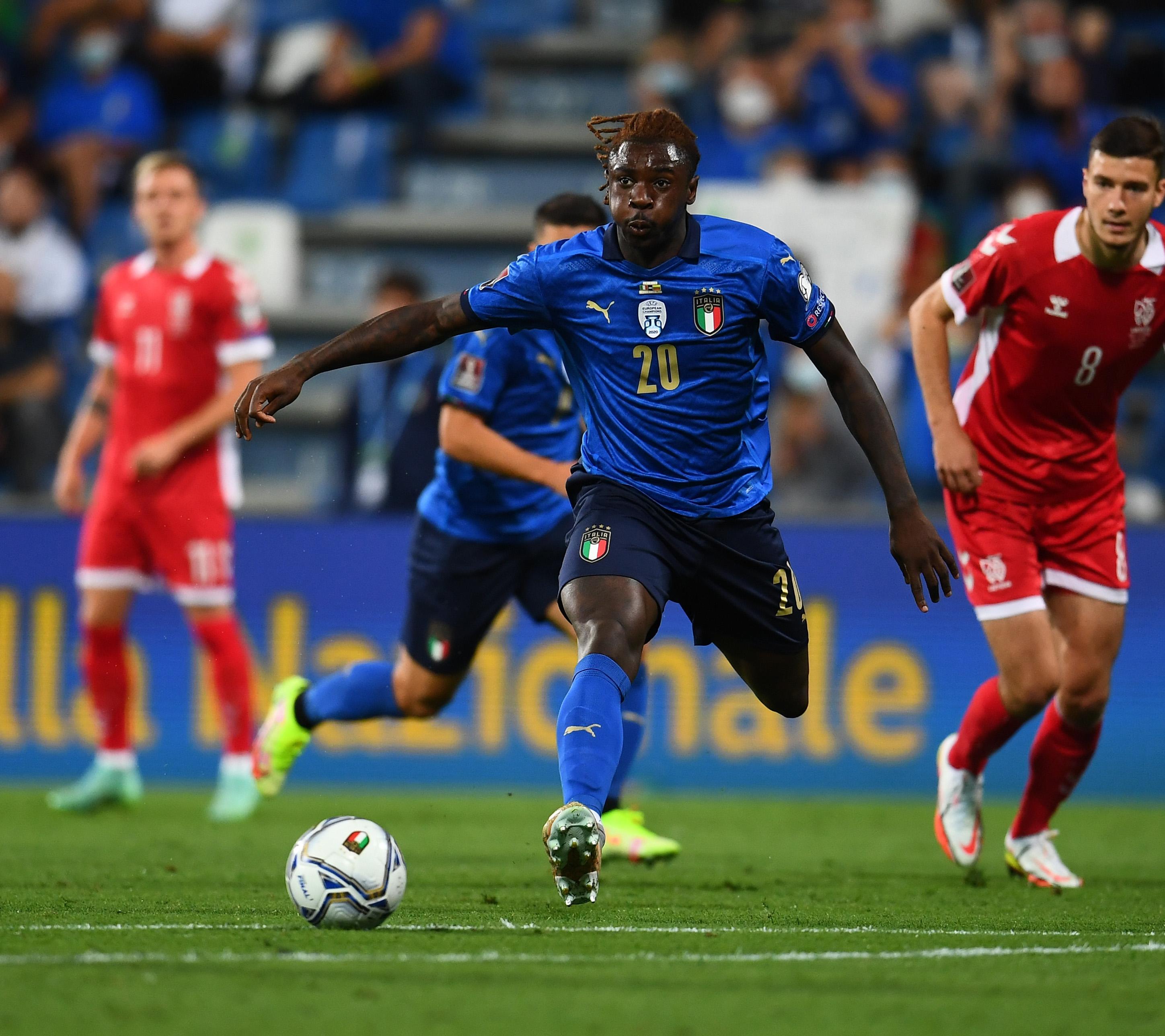 REGGIO NELL'EMILIA, ITALY - SEPTEMBER 08: Moise Kean of Italy scores the opening goal during the 2022 FIFA World Cup Qualifier match between Italy and Lithuania at Mapei Stadium - Citta' del Tricolore on September 08, 2021 in Reggio nell'Emilia, Italy. (Photo by Claudio Villa/Getty Images)