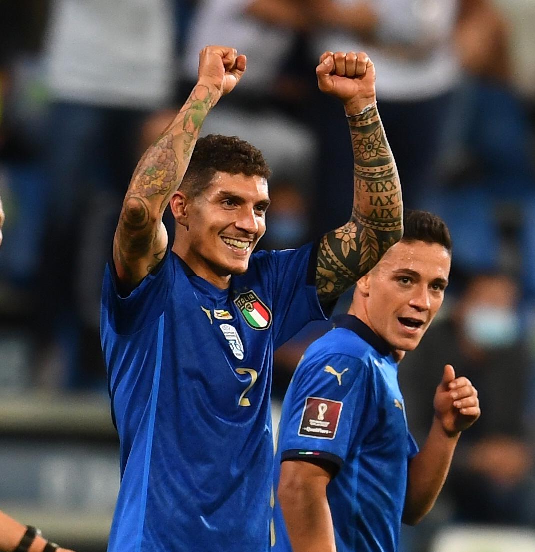 REGGIO NELL'EMILIA, ITALY - SEPTEMBER 08: Giovanni Di Lorenzo of Italy celebrates after scoring the goal during the 2022 FIFA World Cup Qualifier match between Italy and Lithuania at Mapei Stadium - Citta' del Tricolore on September 08, 2021 in Reggio nell'Emilia, . (Photo by Claudio Villa/Getty Images)