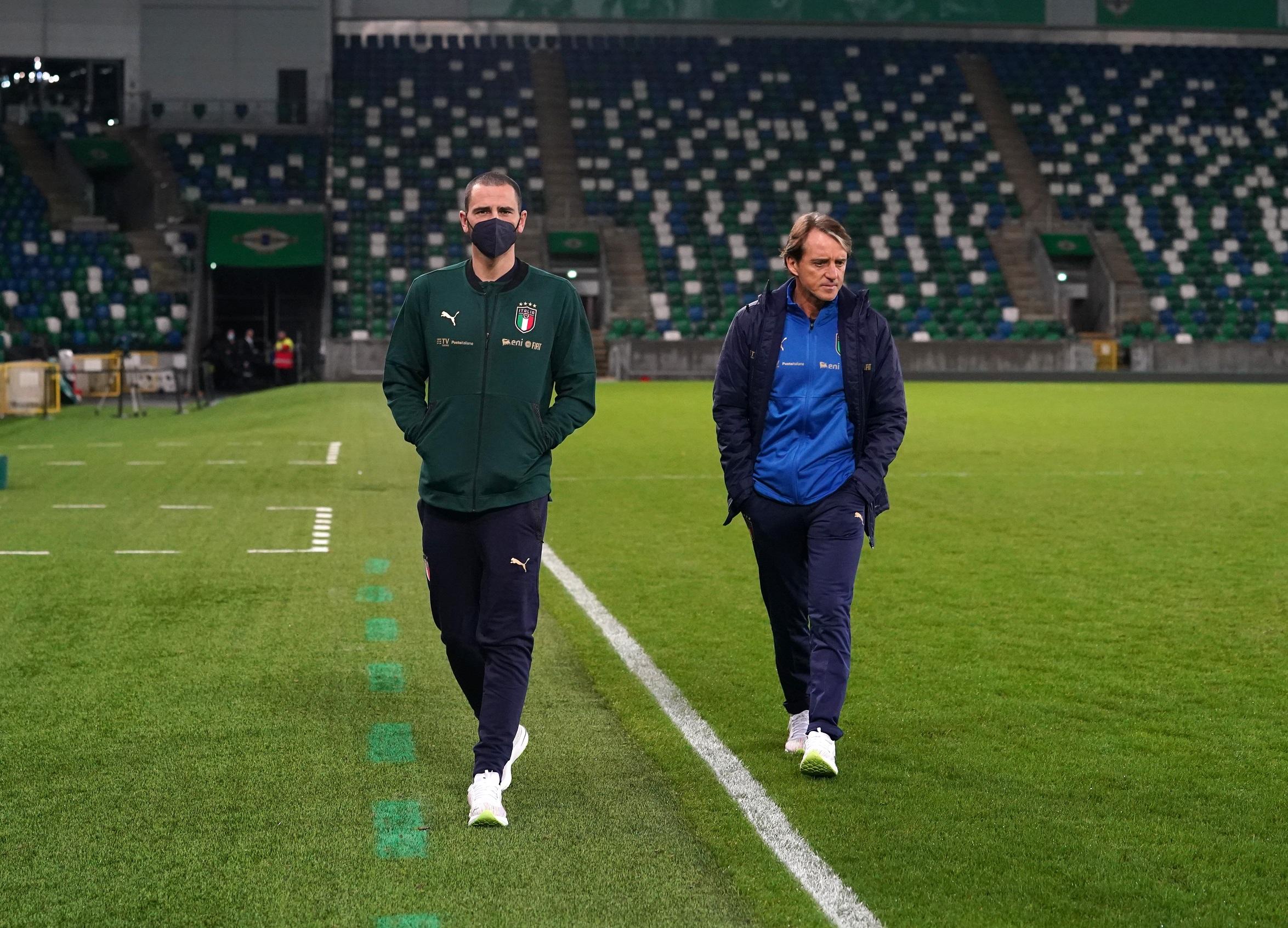 BELFAST, NORTHERN IRELAND - NOVEMBER 14: Head coach Italy Roberto Mancini and Leonardo Bonucci of Italy walk on the pitch before press conference on November 14, 2021 in Belfast, Northern Ireland. (Photo by Claudio Villa/Getty Images)