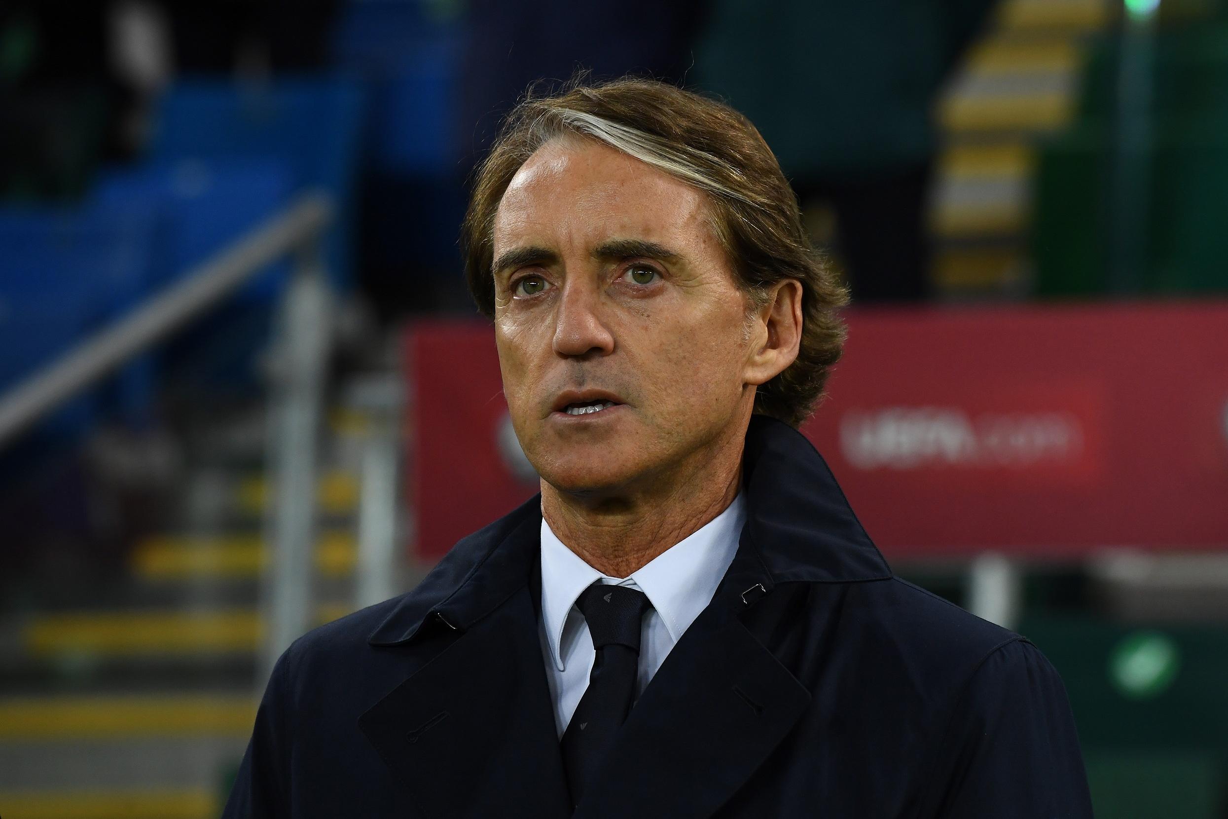 BELFAST, NORTHERN IRELAND - NOVEMBER 15: Head coach of Italy  Roberto Mancini line up for the national anthem prior to the 2022 FIFA World Cup Qualifier match between Northern Ireland and Italy at Windsor Park on November 15, 2021 in Belfast, Northern Ireland. (Photo by Claudio Villa/Getty Images)