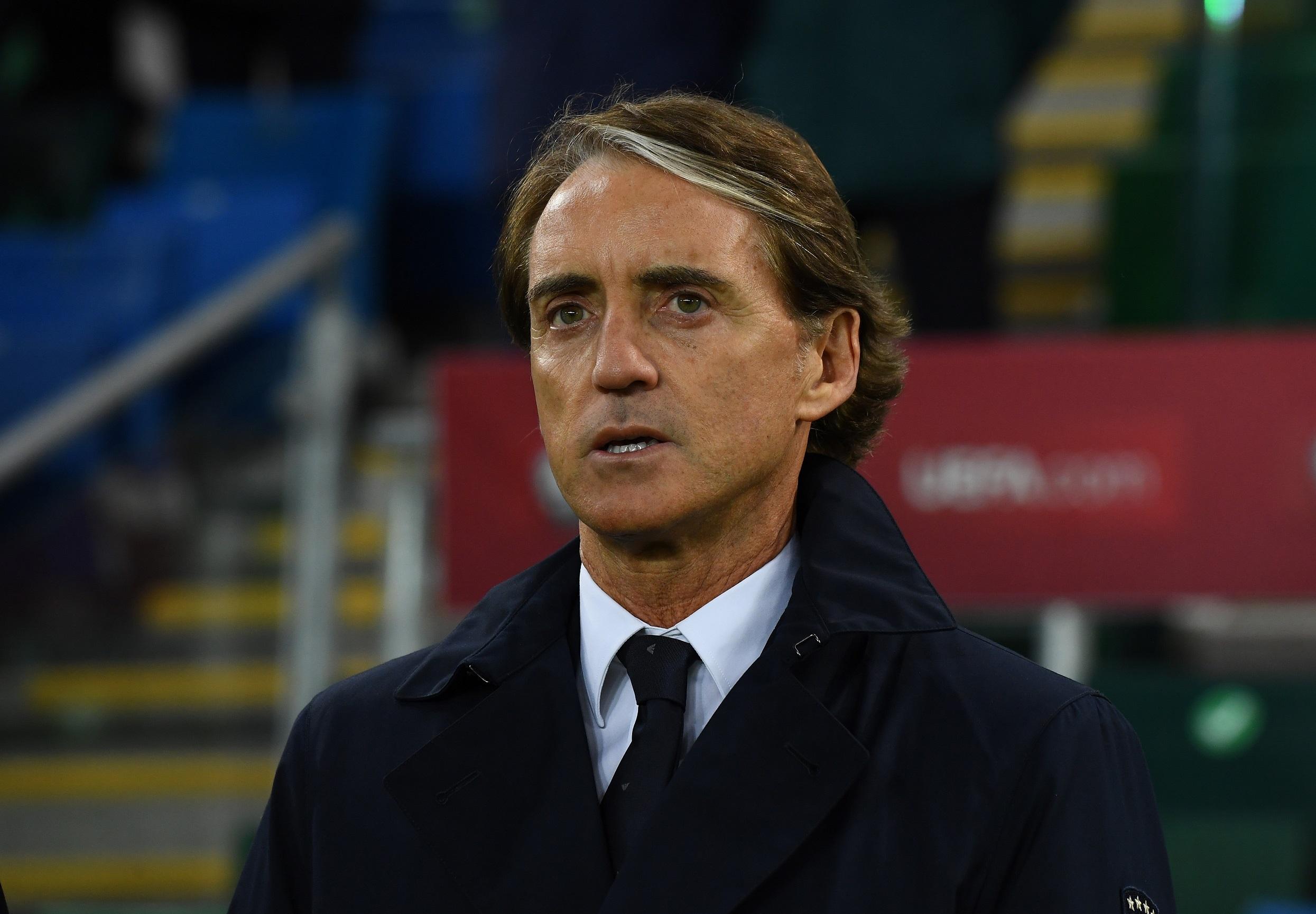 BELFAST, NORTHERN IRELAND - NOVEMBER 15: Head coach of Italy Roberto Mancini line up for the national anthem prior to the 2022 FIFA World Cup Qualifier match between Northern Ireland and Italy at Windsor Park on November 15, 2021 in Belfast, Northern Ireland. (Photo by Claudio Villa/Getty Images)