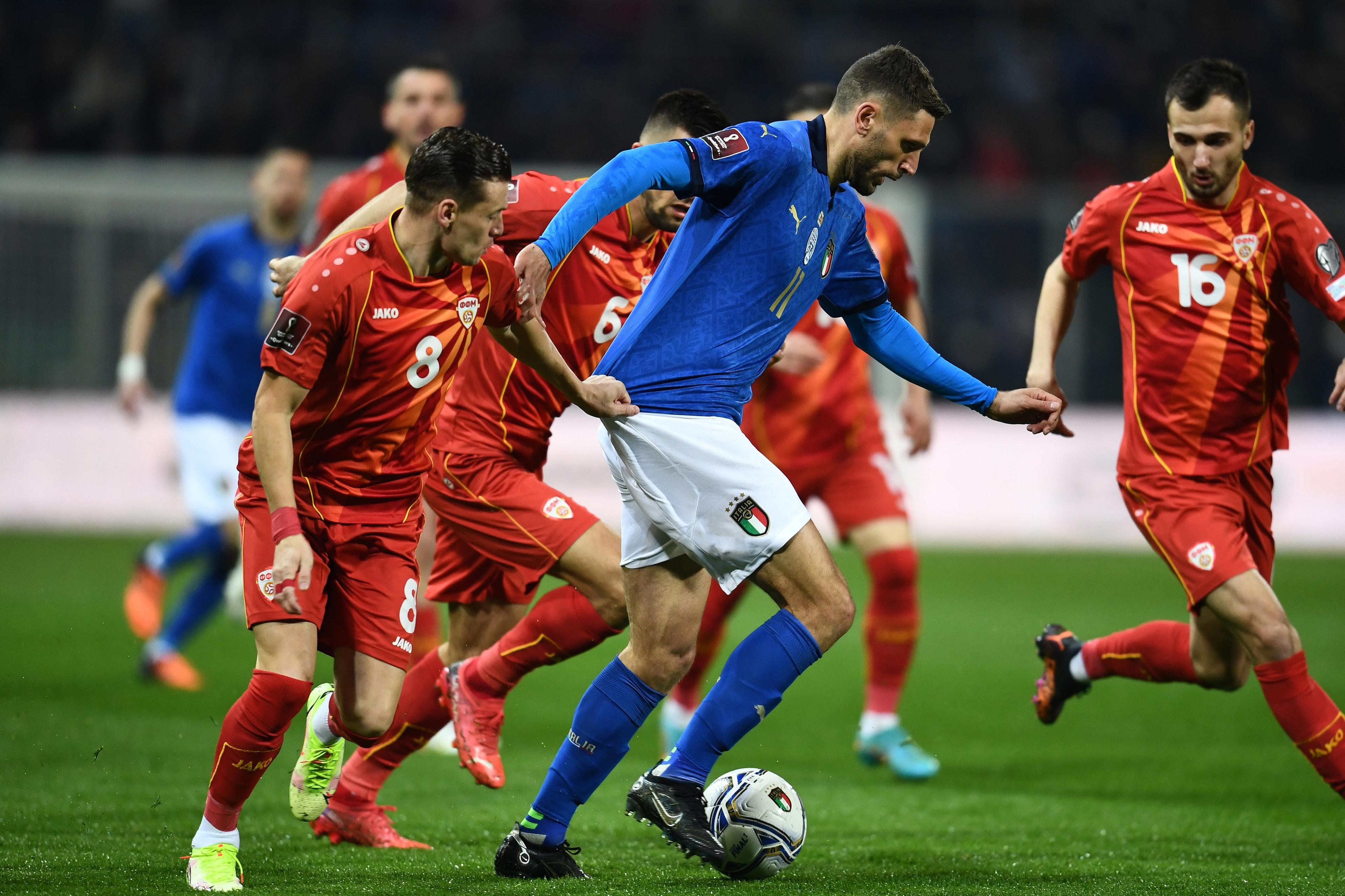 PALERMO, ITALY - MARCH 24: Domenico Berardi of Italy competes for the ball with Ezgjan Alioski of North Macedonia during the 2022 FIFA World Cup Qualifier knockout round play-off match between Italy and North Macedonia at Friends arena on March 24, 2022 in Solna, . (Photo by Claudio Villa/Getty Images)