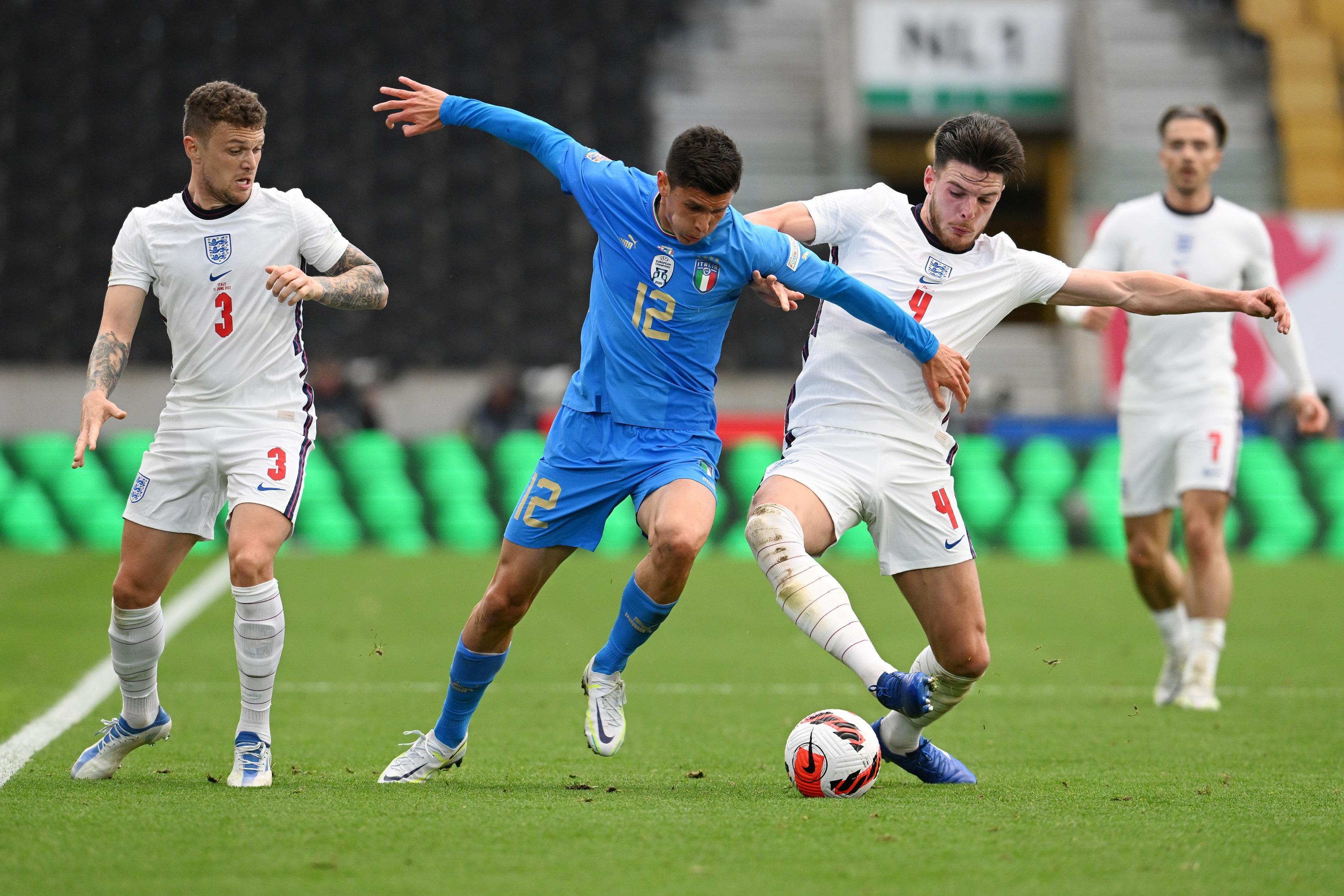 WOLVERHAMPTON, ENGLAND - JUNE 11: Declan Rice of England battles for possession with Matteo Pessina of Italy during the UEFA Nations League - League A Group 3 match between England and Italy at Molineux on June 11, 2022 in Wolverhampton, England. This game will be played behind closed doors following on from the Euro 2020 final. (Photo by Claudio Villa/Getty Images)