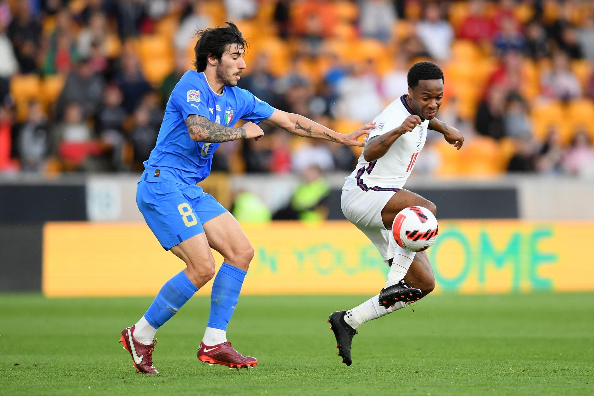 WOLVERHAMPTON, ENGLAND - JUNE 11: Sandro Tonali of Italy battles for possession with Raheem Sterling of England during the UEFA Nations League - League A Group 3 match between England and Italy at Molineux on June 11, 2022 in Wolverhampton, England. This game will be played behind closed doors following on from the Euro 2020 final. (Photo by Claudio Villa/Getty Images)