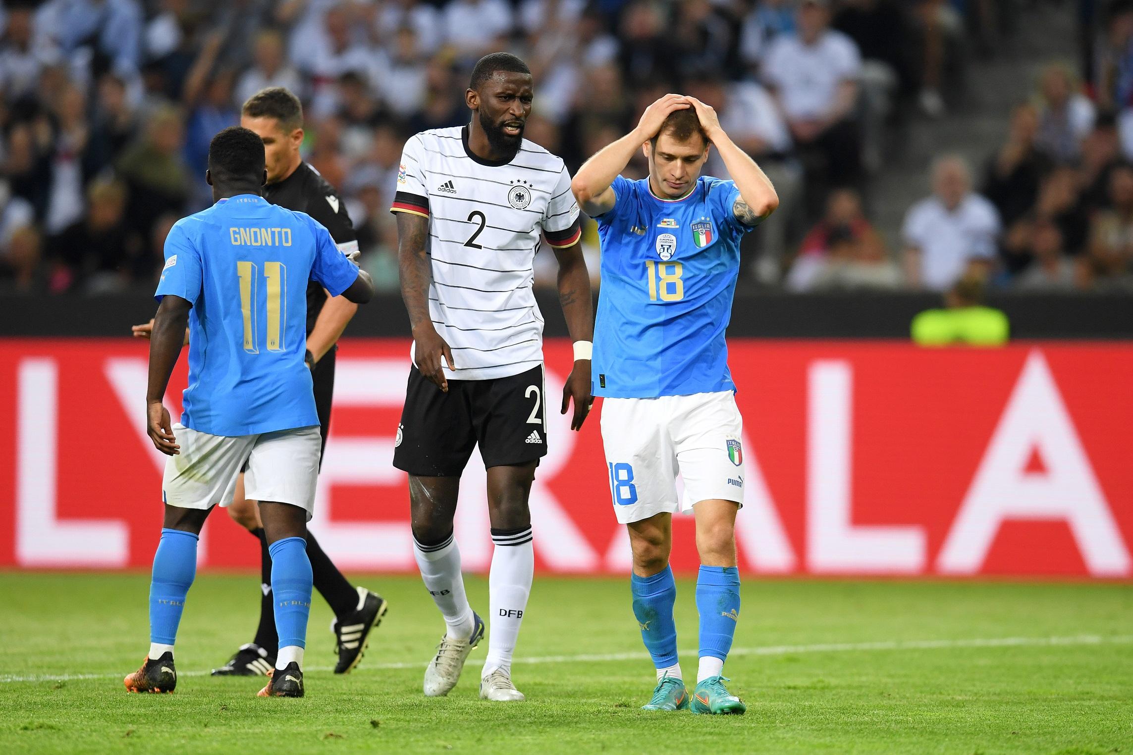 MOENCHENGLADBACH, GERMANY - JUNE 14: Antonio Rudiger of Germany confronts Nicolo Barella of Italy during the UEFA Nations League - League A Group 3 match between Germany and Italy at Borussia Park Stadium on June 14, 2022 in Moenchengladbach, Germany. (Photo by Claudio Villa/Getty Images)