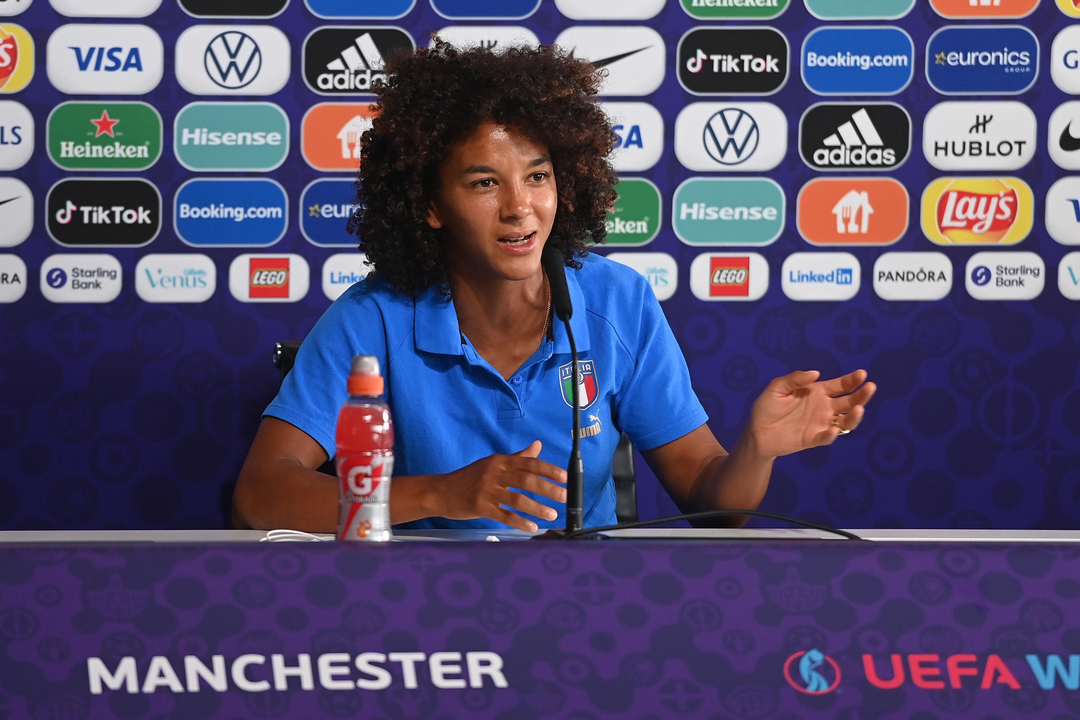 MANCHESTER, ENGLAND - JULY 17: Sara Gama, of Italy, speaks to the media during the UEFA Women's Euro England 2022 Italy Press Conference And Training Session at Manchester City Academy Stadium on July 17, 2022 in Manchester, England. (Photo by Tullio M. Puglia/Getty Images)
