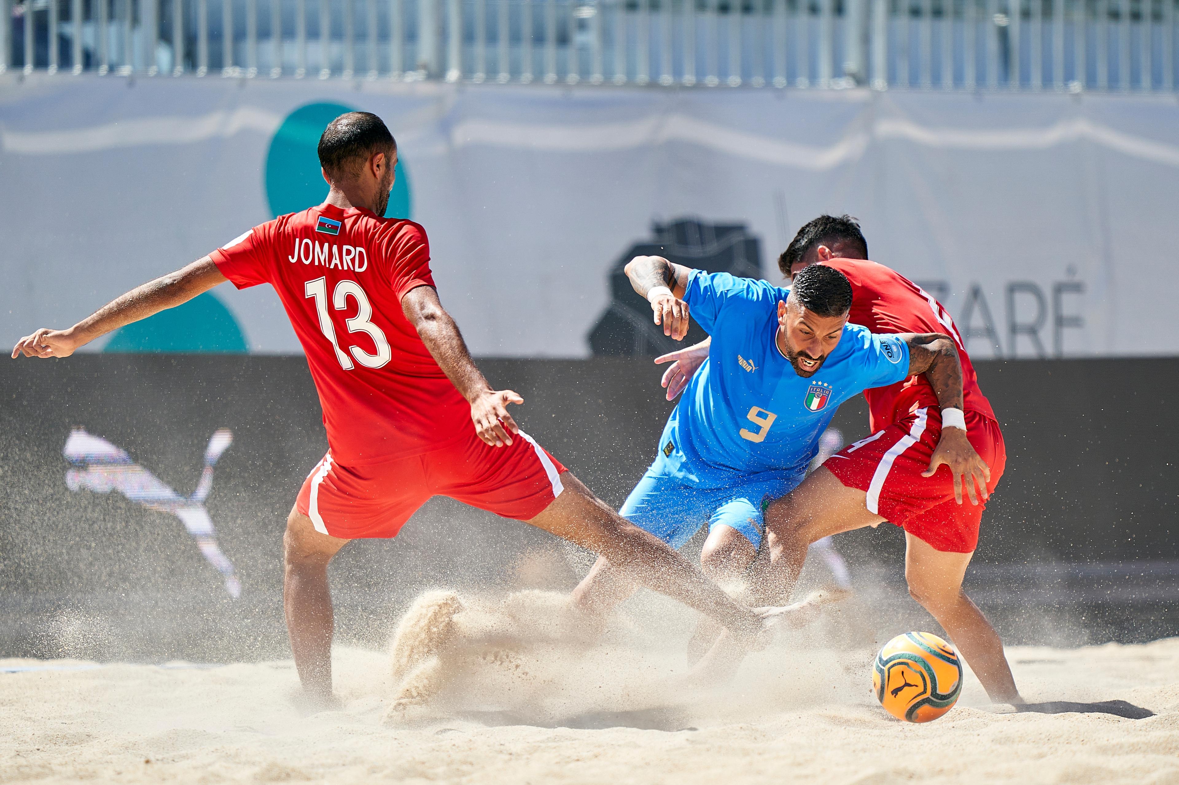 Jomard Bakhshaliyev of Azerbaijan, Emmanuele Zurlo of Italy and Elshad Manafov of Azerbaijan during day one of Euro Beach Soccer League Nazare 2022 at Estadio do Viveiro-Jordan Santos on July 1, 2022 in Nazare, Portugal. (Photo by Jose Manuel Alvarez/BSWW)