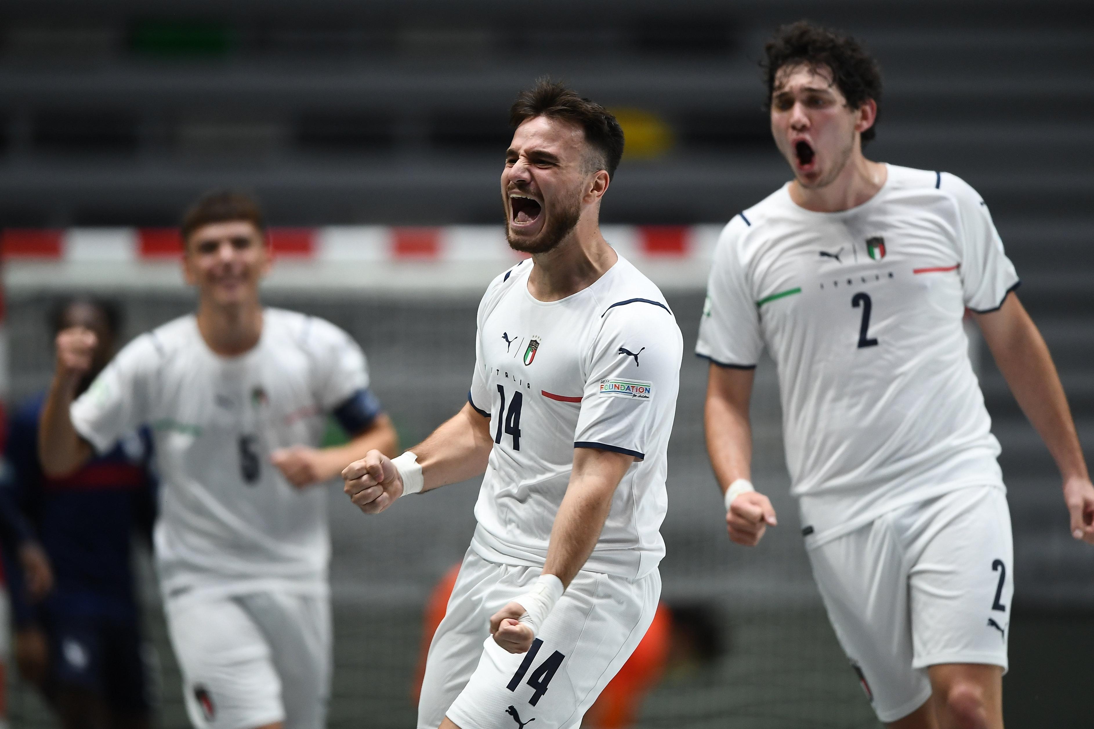JA\\u00C9N, SPAIN - SEPTEMBER 4: Tommaso Ansaloni of Italy celebrates with teammate Nicol\\u00F2 Pieri, right, after scoring his side\\'s second goal during the UEFA Under-19 Futsal EURO 2022 match between France and Italy at the Olivo Arena on September 4, 2022 in Ja\\u00E9n, Spain. (Photo by Harry Murphy - UEFA/UEFA via Sportsfile)