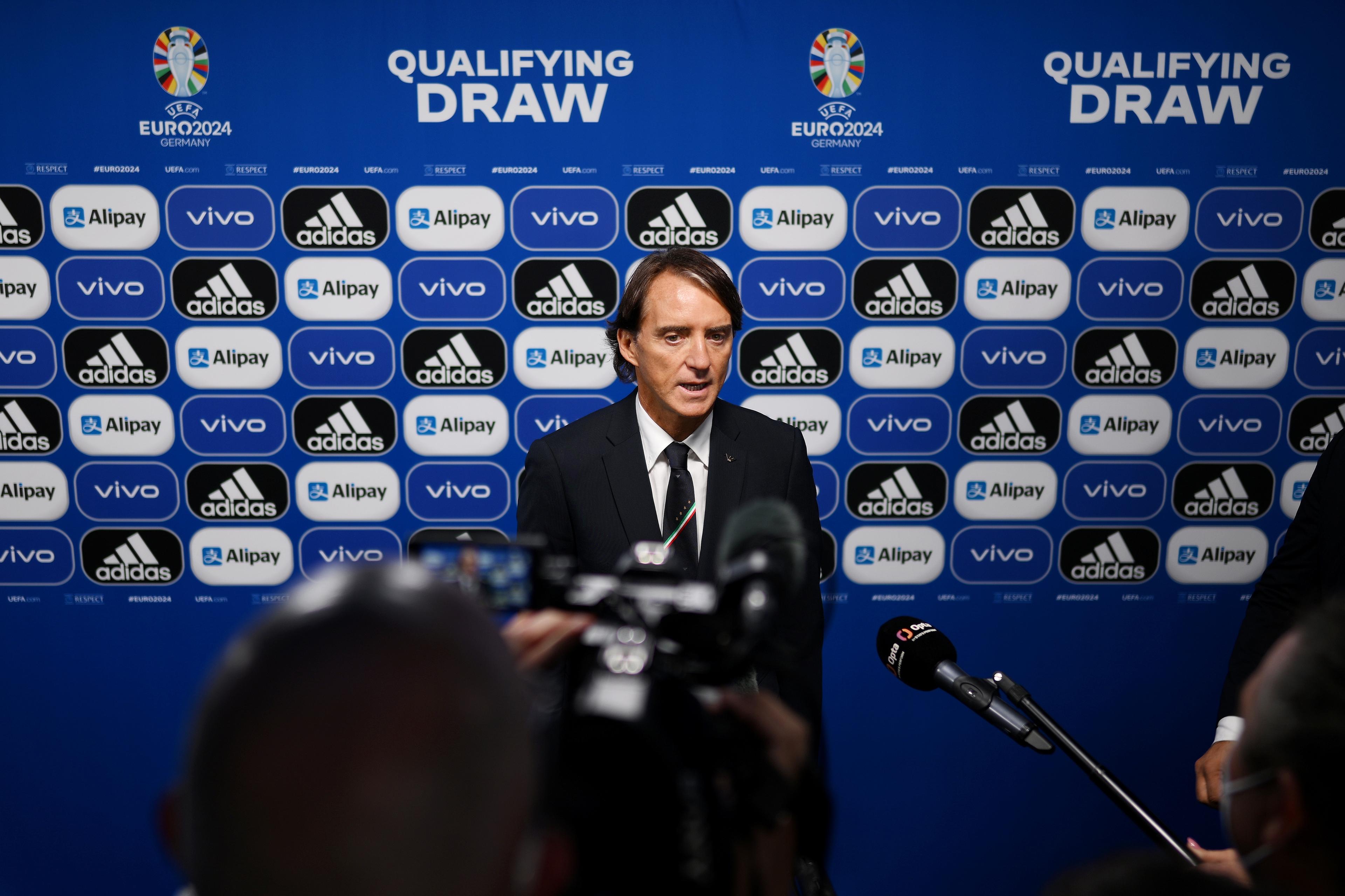 FRANKFURT AM MAIN, GERMANY - OCTOBER 09: Roberto Mancini, Head Coach of Italy is interviewed following the UEFA EURO 2024 qualifying round draw at Messe Frankfurt on October 09, 2022 in Frankfurt am Main, Germany. (Photo by Lukas Schulze - UEFA/UEFA via Getty Images)