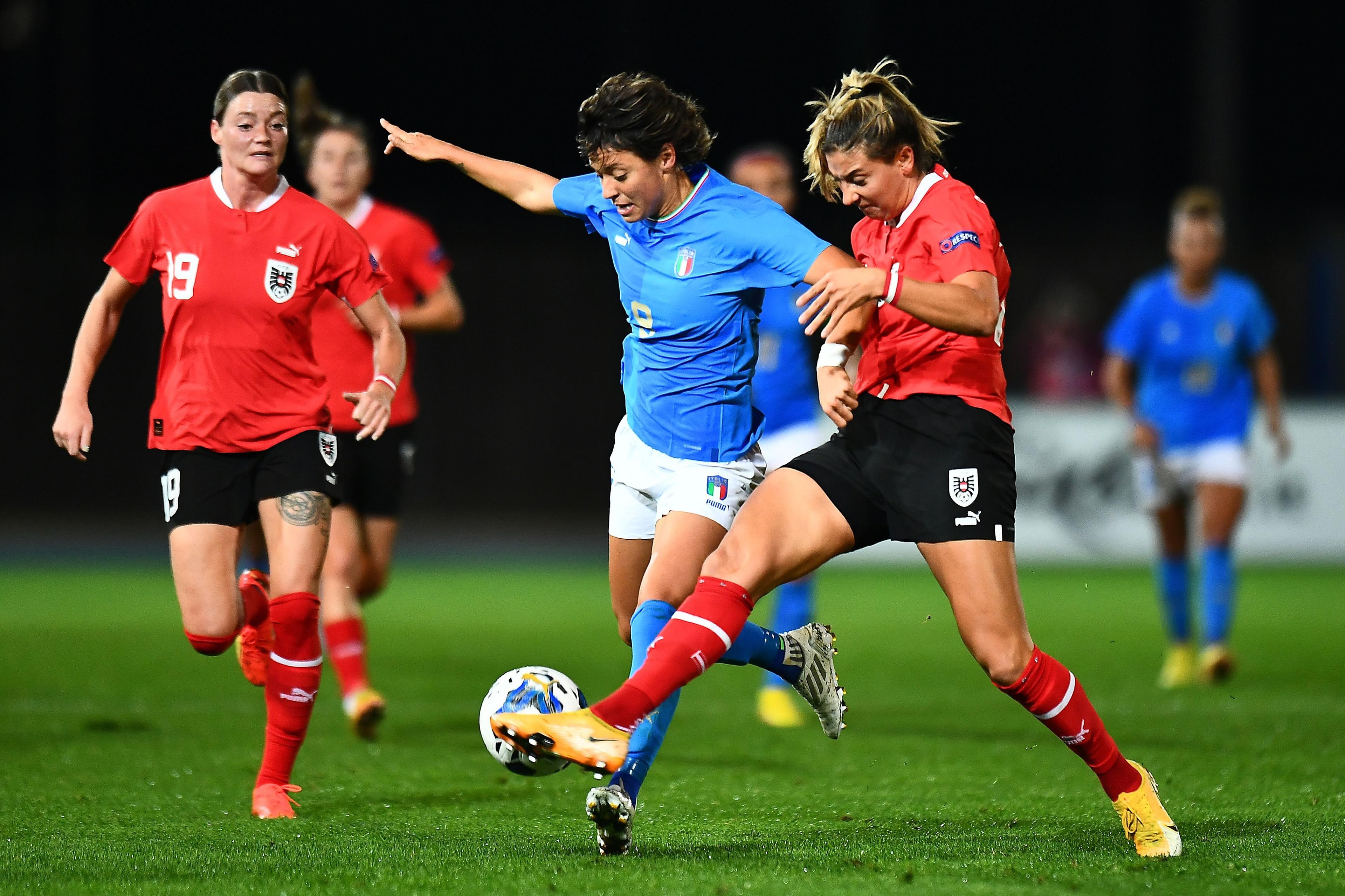 LIGNANO SABBIADORO, ITALY - NOVEMBER 11: Valentina Giacinti of Italy women competes for the ball with Marina Georgieva of Austria women during the Women\\'s Frienly match between Italy and Austria at Stadio Guido Teghil on November 11, 2022 in Lignano Sabbiadoro, Italy. (Photo by Alessandro Sabattini/Getty Images)