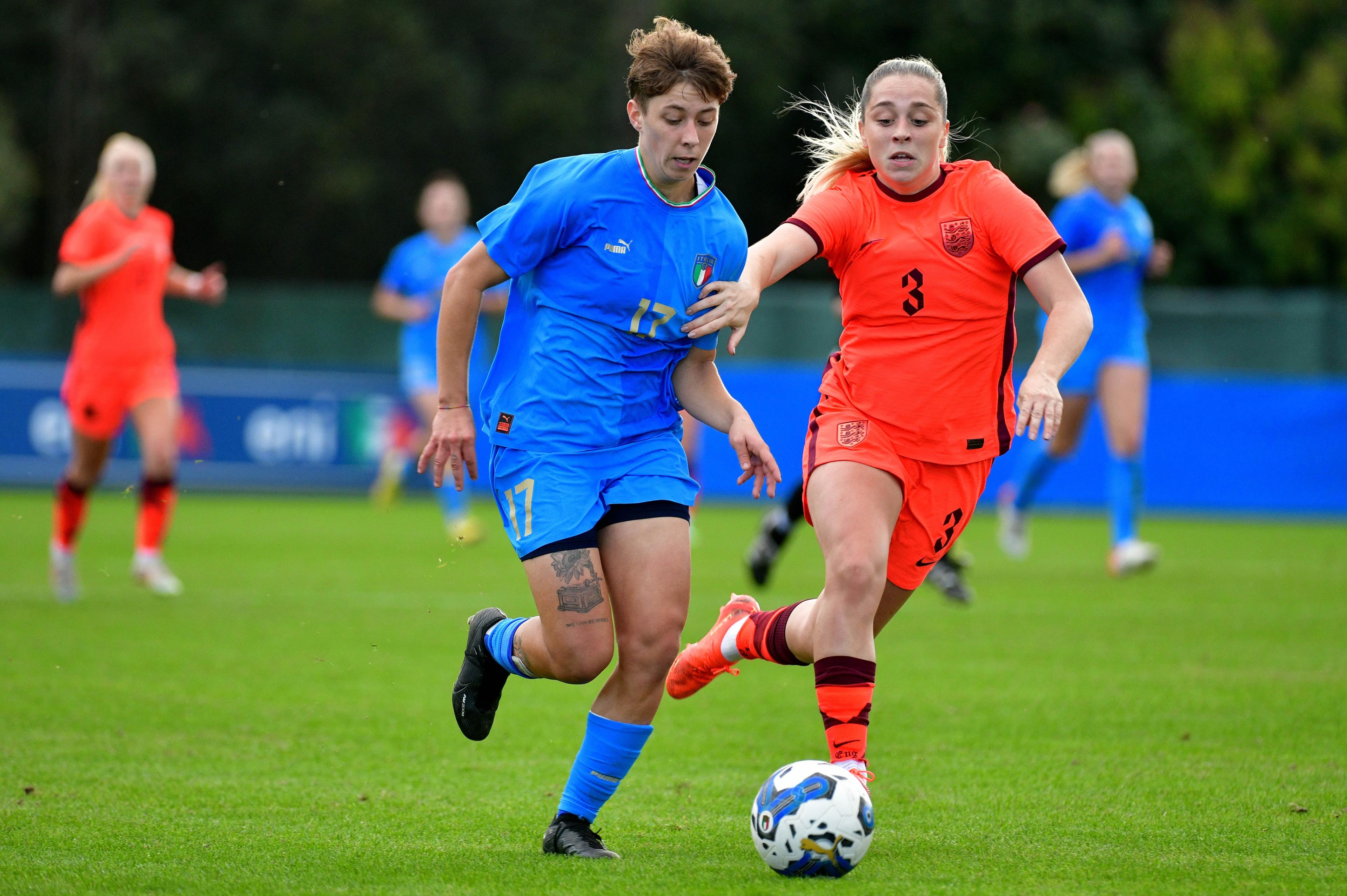 ROME, ITALY - NOVEMBER 14: Margherita Monnecchi of Italy compete for the ball with Poppy Pattinson of England during the WU23 International Friendly match between Italy Women and England Women at tre fontane stadium on November 14, 2022 in Rome, Italy. (Photo by Marco Rosi/Getty Images)