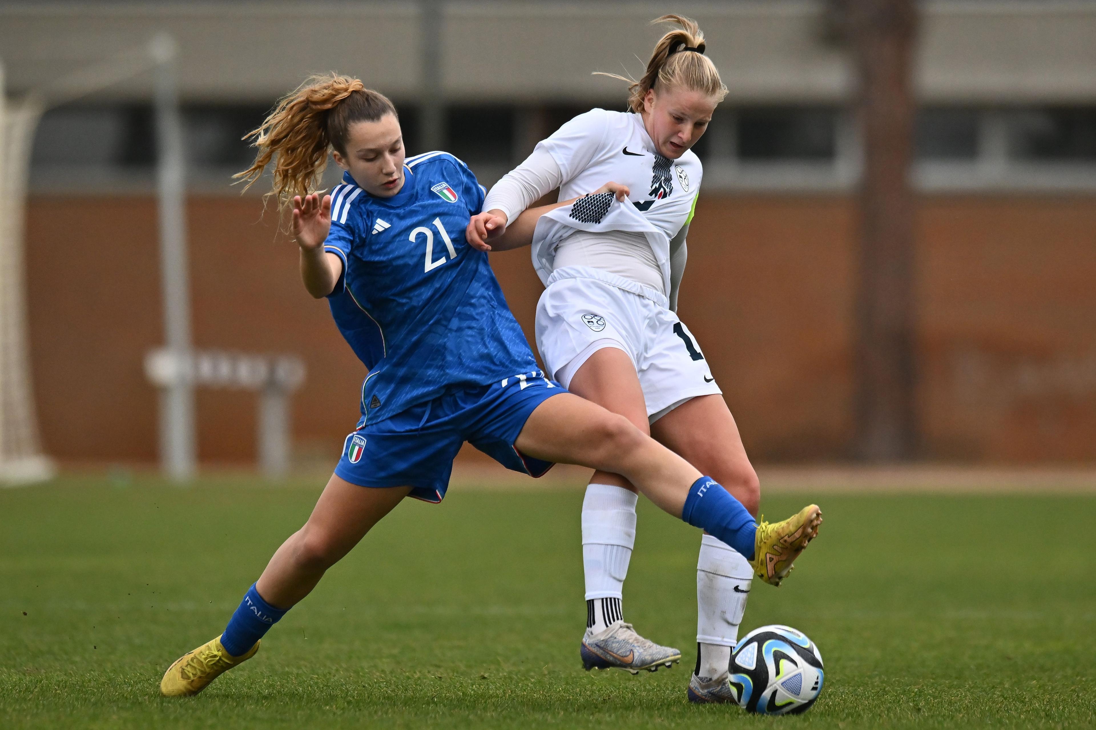 TIRRENIA, ITALY - FEBRUARY 19: Sofia Testa of Italy U17 competes for the ball with Zara Kramzar of Slovenia U17 during the Women International Friendly match between Italy U17 and Slovenia U17 on February 19, 2023 in Tirrenia, Italy. (Photo by Alessandro Sabattini/Getty Images)