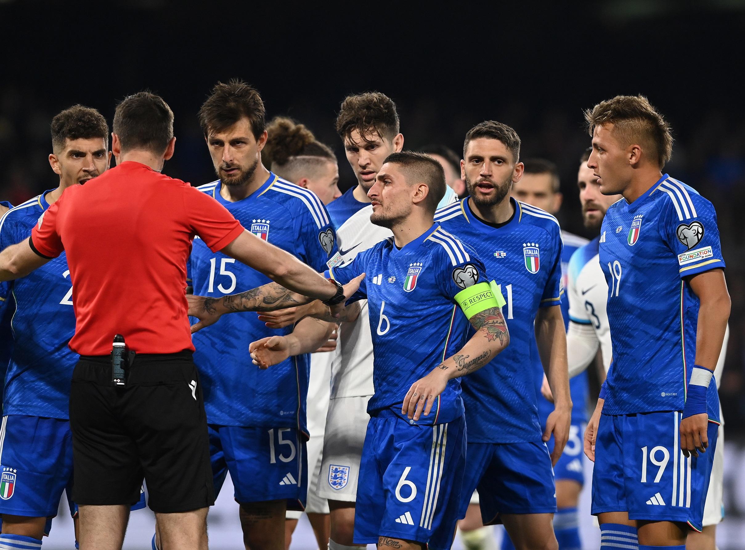 NAPLES, ITALY - MARCH 23: Francesco Acerbi and Marco Verratti of Italy reacts during the UEFA EURO 2024 qualifying round group C match between Italy and England at Stadio Diego Armando Maradona on March 23, 2023 in Naples, Italy. (Photo by Claudio Villa/Getty Images )