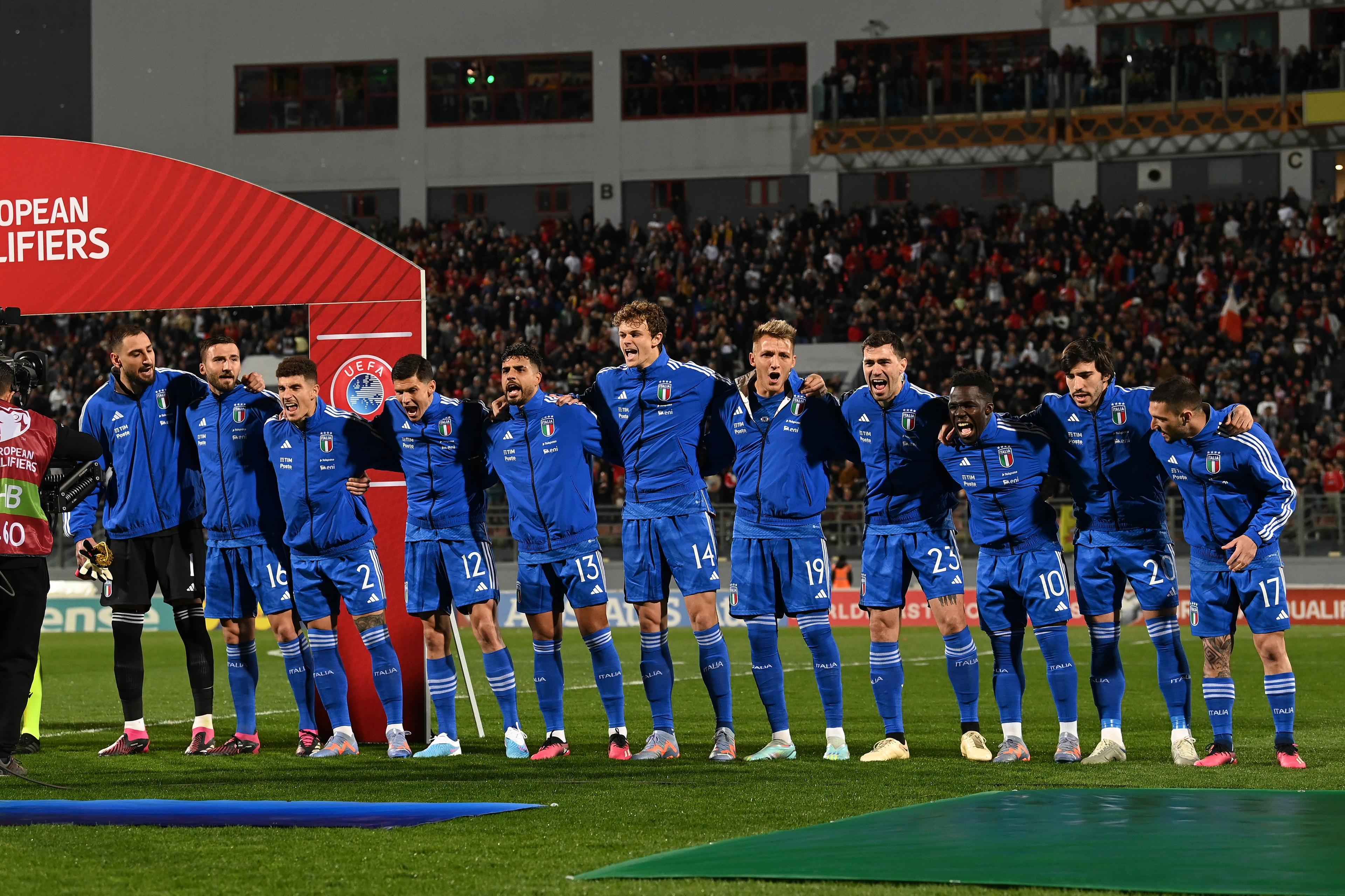 MALTA, MALTA - MARCH 26:  Players of Italy line up during the National Anthems prior to the UEFA EURO 2024 qualifying round group C match between Malta and Italy at the National Stadium on March 26, 2023 in Ta\\' Qali, Malta. (Photo by Claudio Villa/Getty Images )