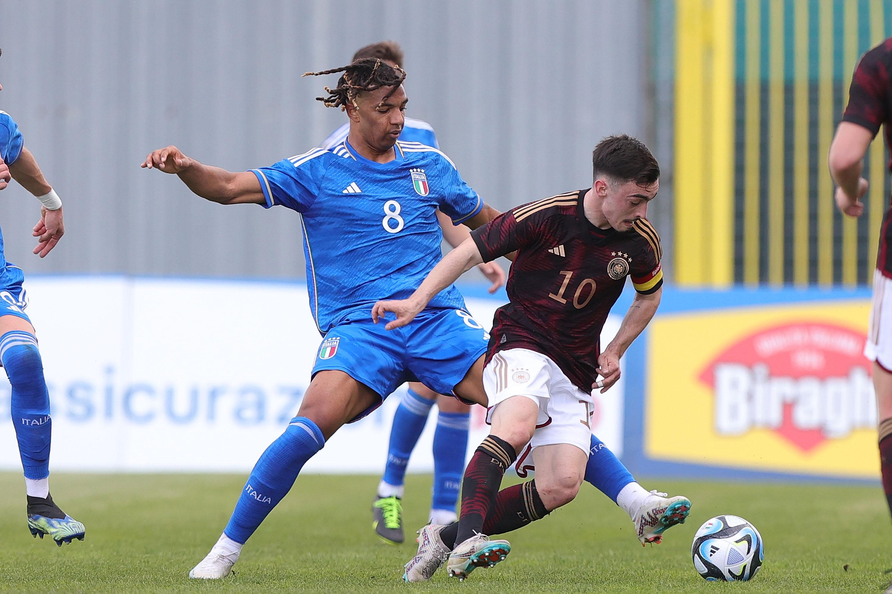 PRATO, ITALY - MARCH 27: Cher Ndour of Italy U20 battles for the ball with Paul Neber Germany U20 during the U20 international friendly match between Italy and Germany at Stadio Lungobisenzio on March 27, 2023 in Prato, Italy. (Photo by Gabriele Maltinti/Getty Images) *** Local Caption *** Cher Ndour; Paul Neber