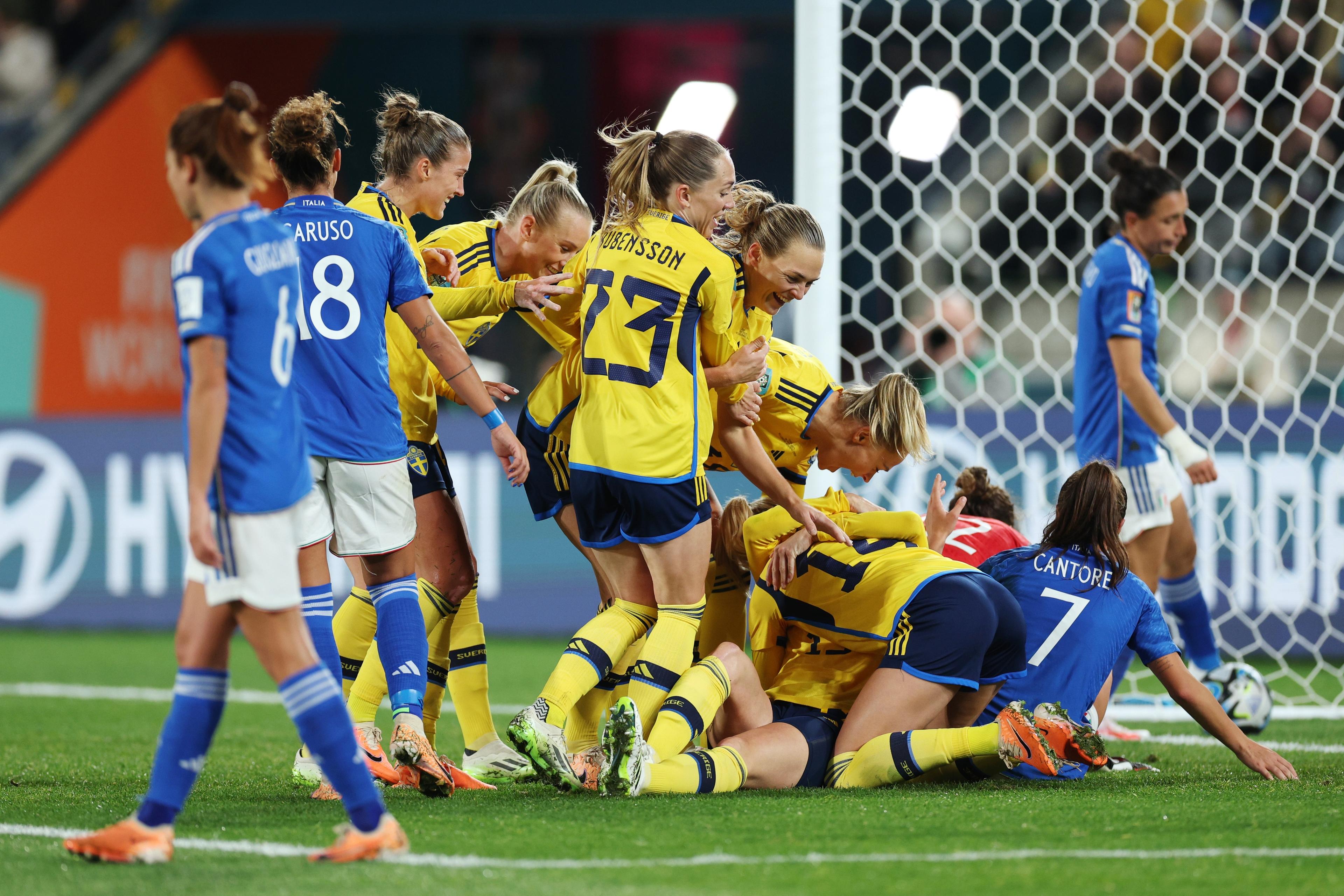 WELLINGTON, NEW ZEALAND - JULY 29: Amanda Ilestedt (bottom) of Sweden celebrates with teammates after scoring her team's first goal during the FIFA Women's World Cup Australia & New Zealand 2023 Group G match between Sweden and Italy at Wellington Regional Stadium on July 29, 2023 in Wellington, New Zealand. (Photo by Hagen Hopkins - FIFA/FIFA via Getty Images)