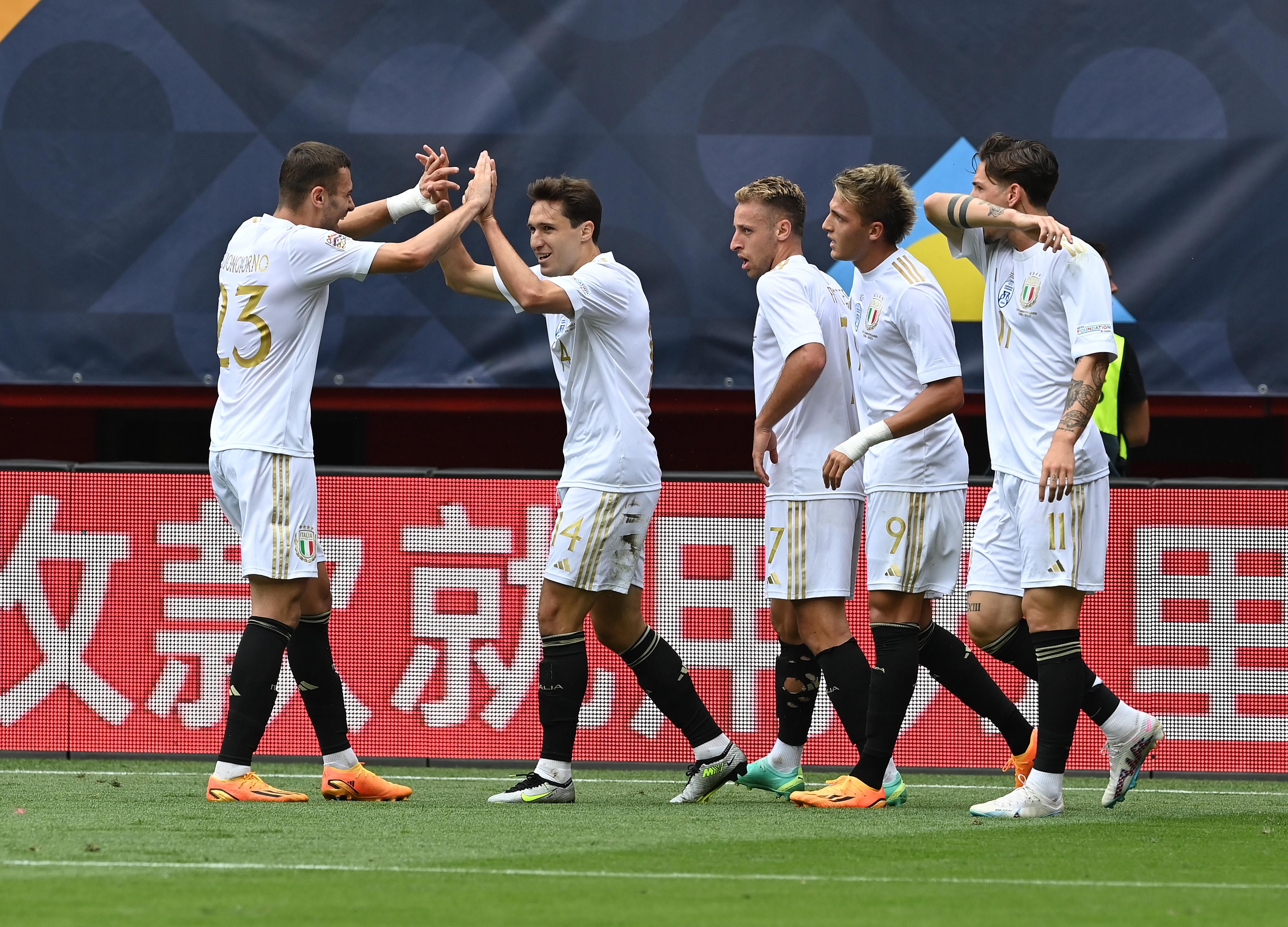 ENSCHEDE, NETHERLANDS - JUNE 18: Federico Chiesa of Italy celebrates with team-mates after scoring the goal during the UEFA Nations League 2022/23 third-place match between Netherlands and Italy at FC Twente Stadium on June 18, 2023 in Enschede, Netherlands. (Photo by Claudio Villa/Getty Images)