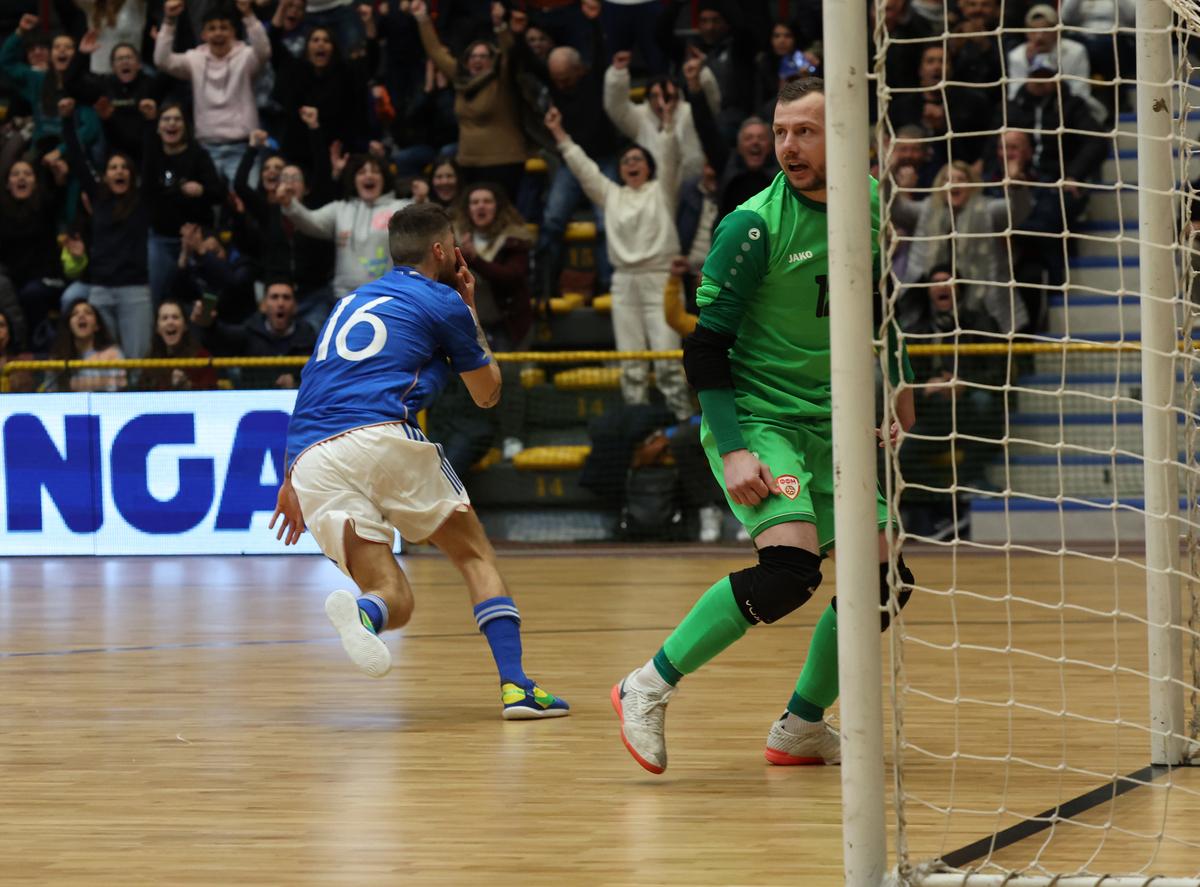 CATANIA, ITALY - MARCH 01: Cristopher Dyan Cutrupi of Italy celebrates his team's first goal during 2024 Futsal World Cup Qualifying match played between Italy and North Macedonia at Palacatania on March 01, 2023 in Catania, Italy. (Photo by Maurizio Lagana/Getty Images)