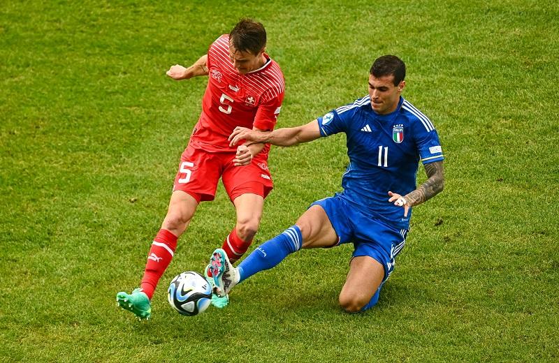 CLUJ-NAPOCA, ROMANIA - JUNE 25: Marco Burch of Switzerland in action against Pietro Pellegri of Italy during the UEFA Under-21 EURO 2023 Finals Group D match between Switzerland and Italy at the Cluj Arena on June 25, 2023 in Cluj Napoca, Romania. (Photo by Eóin Noonan - Sportsfile/UEFA via Getty Images)