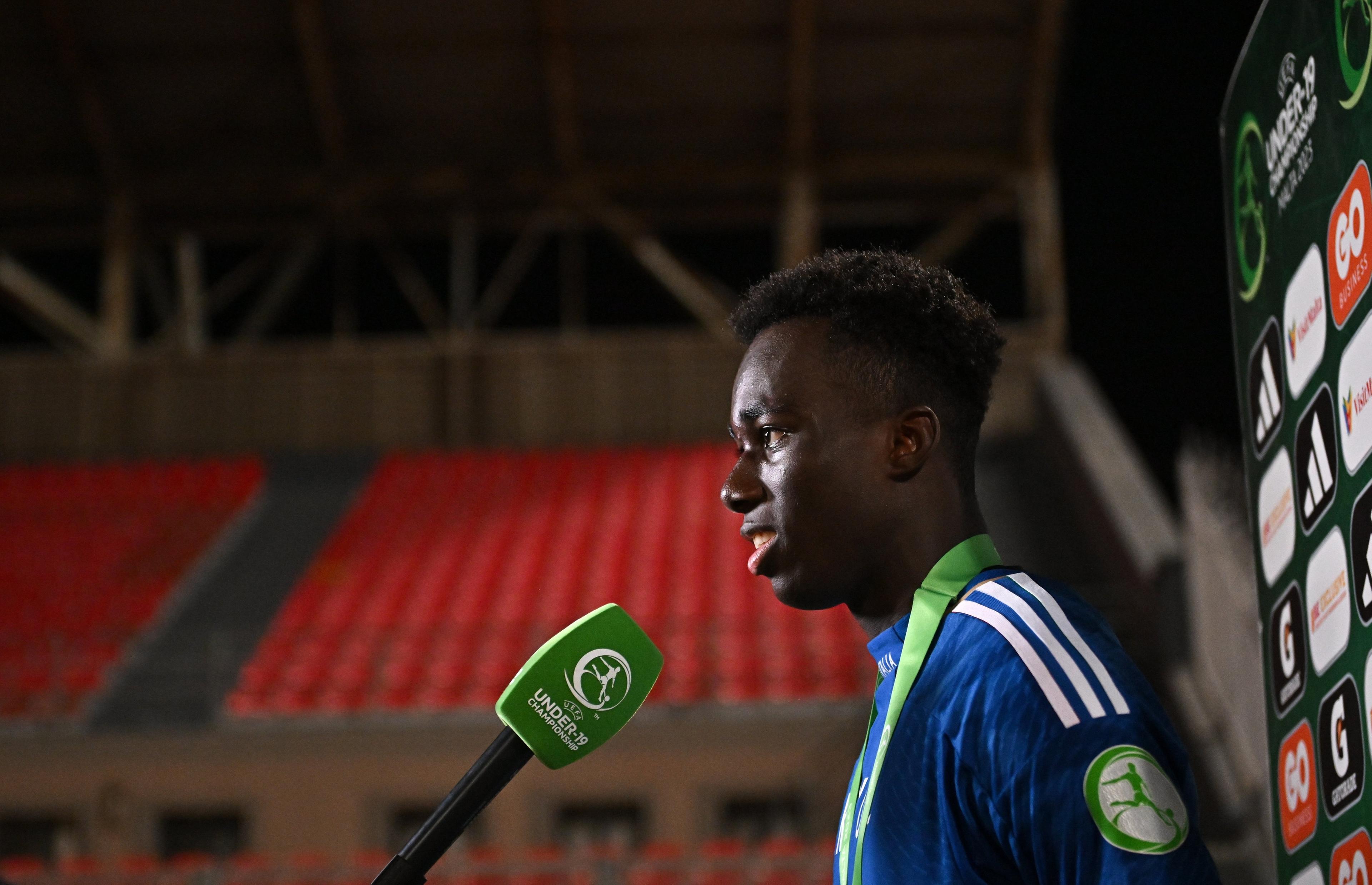 TA' QALI, MALTA - JULY 16: Michael Olabode Kayode of Italy is interviewed after the UEFA European Under-19 Championship 2022/23 final match between Portugal and Italy at the National Stadium on July 16, 2023 in Ta' Qali, Malta. (Photo by Seb Daly - Sportsfile/UEFA via Getty Images)