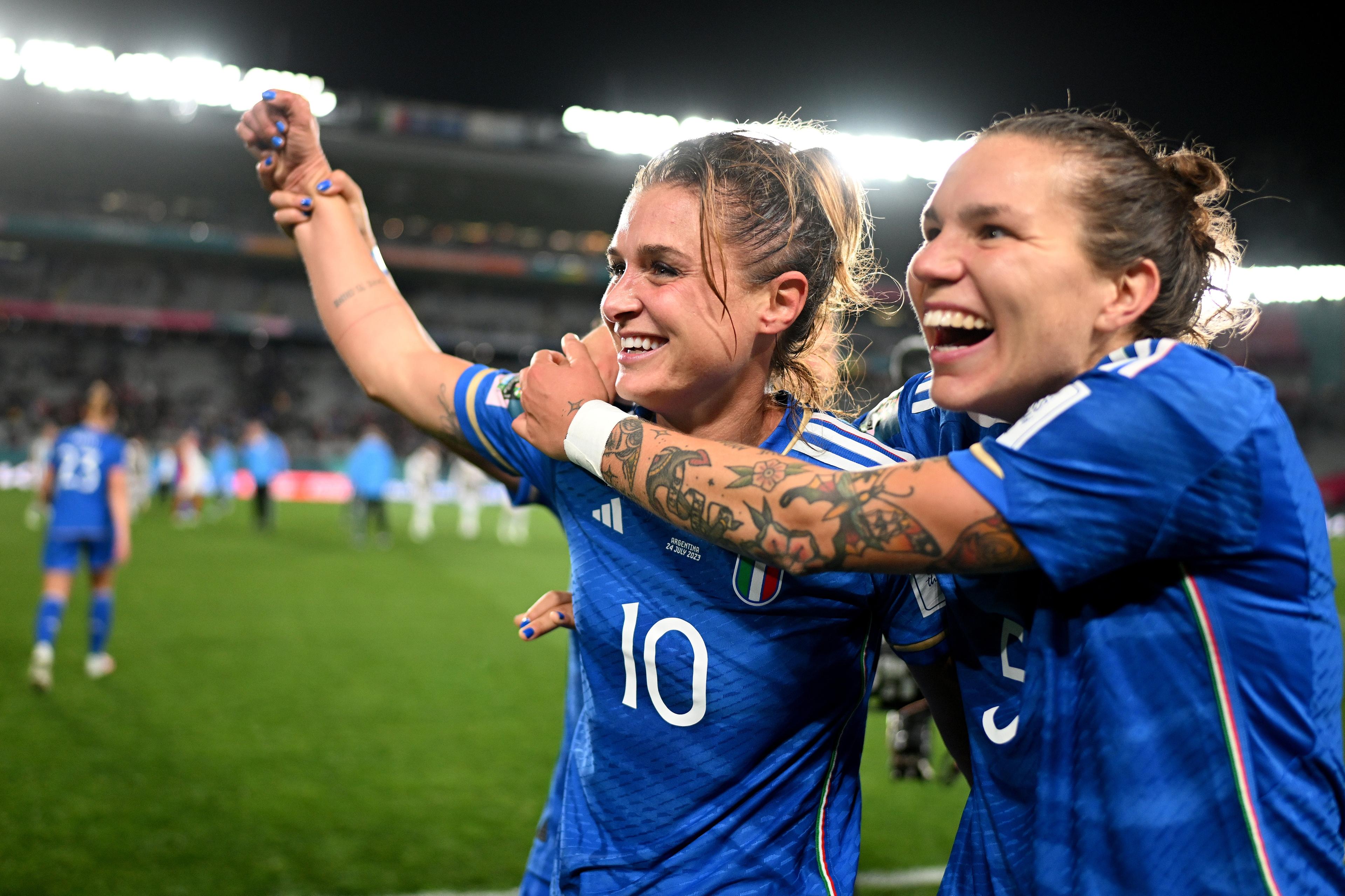AUCKLAND, NEW ZEALAND - JULY 24: Cristiana Girelli (L) and Elena Linari (R) of Italy celebrate the team\\'s 1-0 victory in the FIFA Women\\'s World Cup Australia & New Zealand 2023 Group G match between Italy and Argentina at Eden Park on July 24, 2023 in Auckland / T\\u00C4\\u0081maki Makaurau, New Zealand. (Photo by Hannah Peters - FIFA/FIFA via Getty Images)