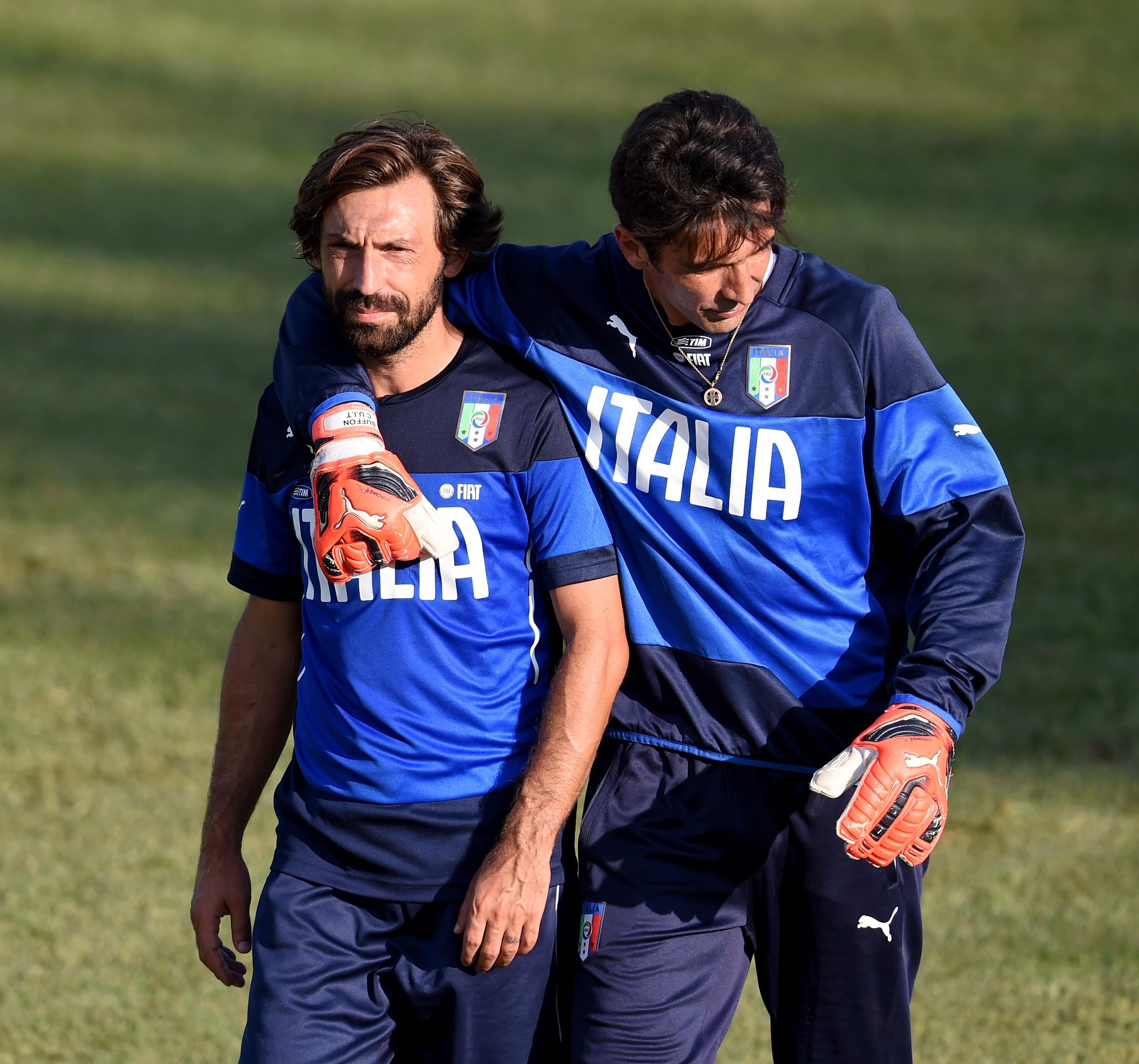 FLORENCE, ITALY - SEPTEMBER 02: Andrea Pirlo (L) and Gianluigi Buffon during an Italy training session at Coverciano on September 02, 2015 in Florence, Italy. (Photo by Claudio Villa/Getty Images)