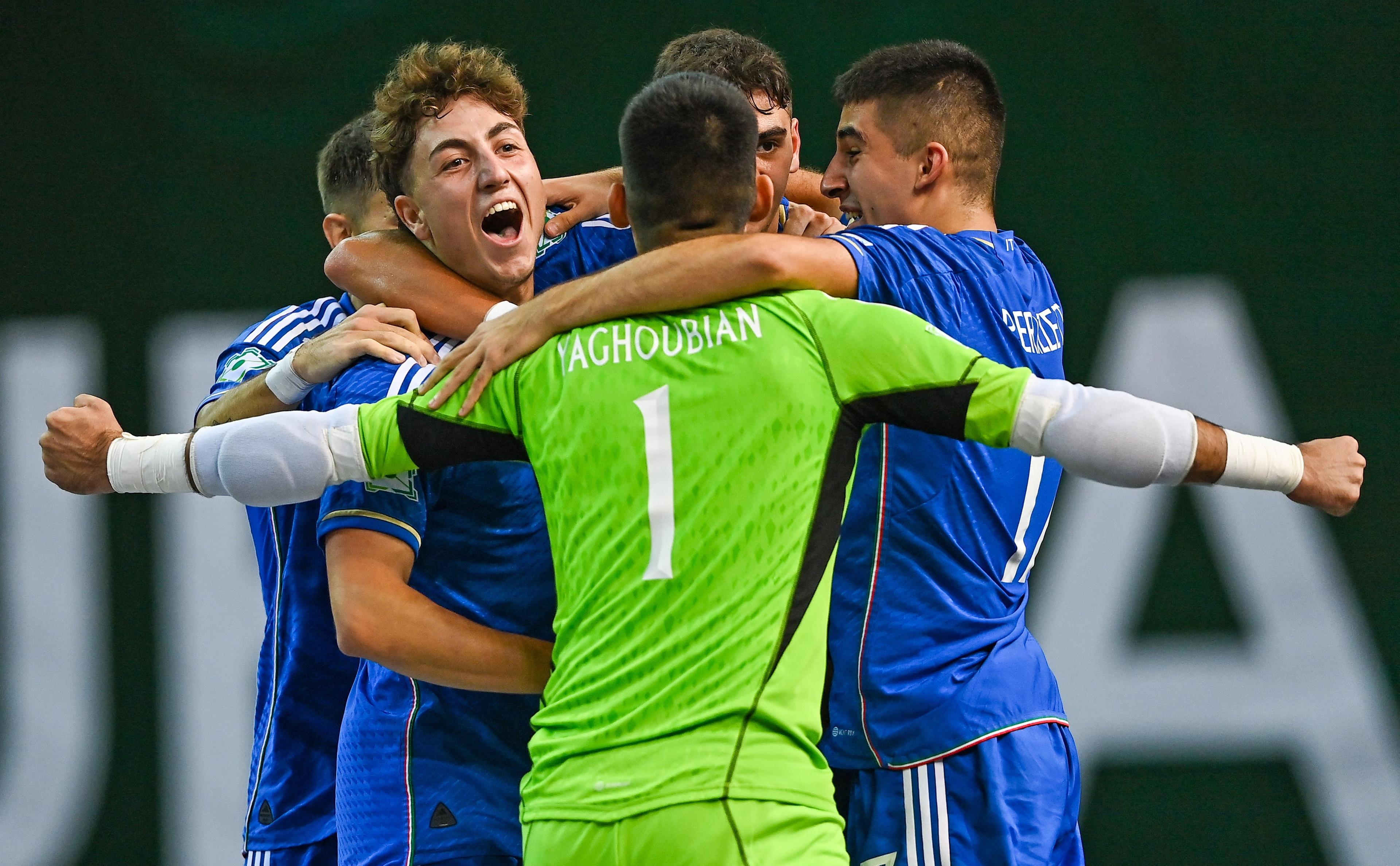 POREC, CROATIA - SEPTEMBER 4: Francesco Vescio of Italy, left, celebrates with team-mates after scoring his side's second goal during the UEFA Under-19 Futsal EURO 2023 match between Italy and Finland at the Zatika Arena on 4 September 2023 in Porec, Croatia. (Photo by Piaras Ã“ MÃdheach - Sportsfile/UEFA via Getty Images)