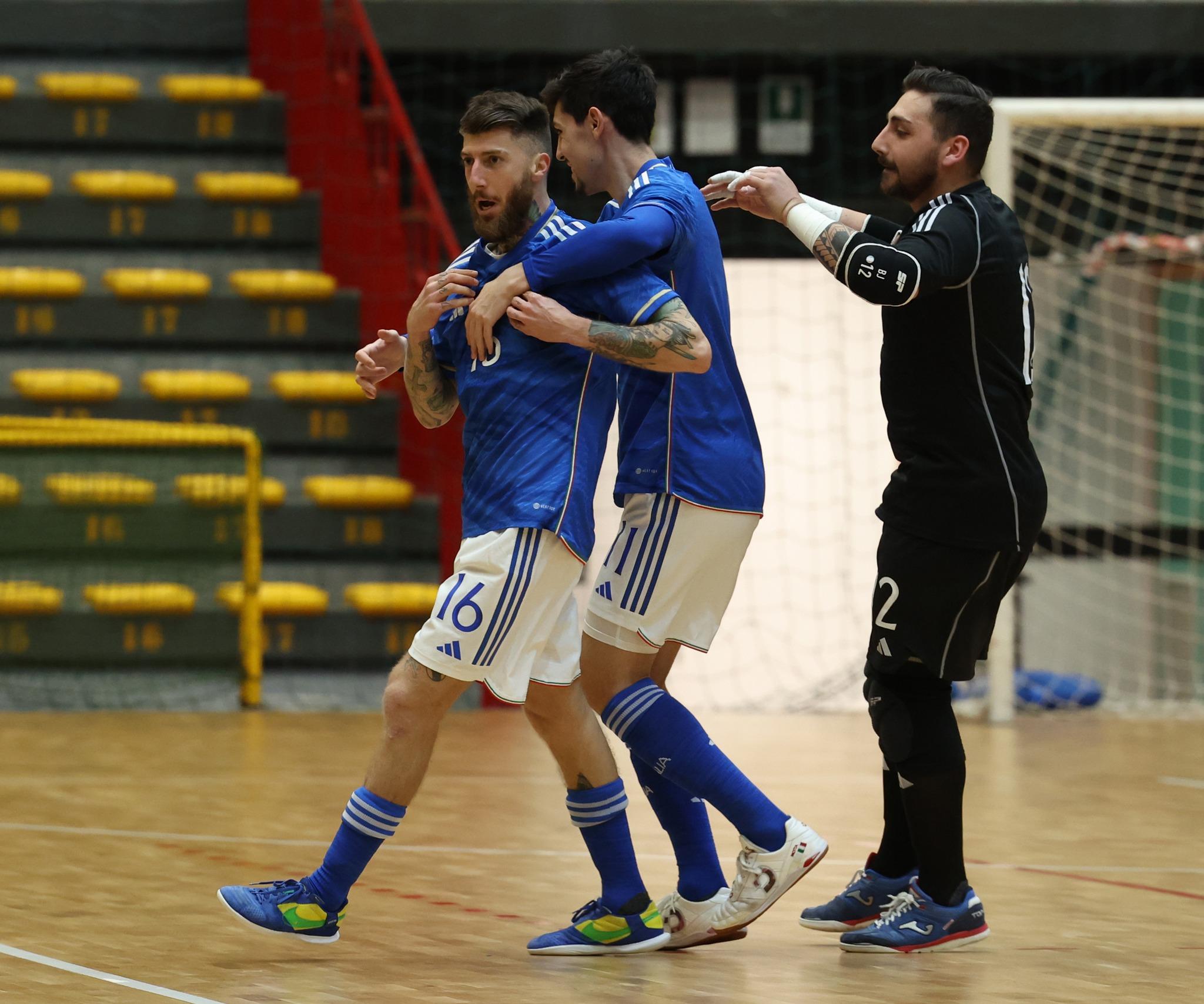 CATANIA, ITALY - MARCH 01: Cristopher Dyan Cutrupi of Italy celebrates his team's first goal during 2024 Futsal World Cup Qualifying match played between Italy and North Macedonia at Palacatania on March 01, 2023 in Catania, Italy. (Photo by Maurizio Lagana/Getty Images)