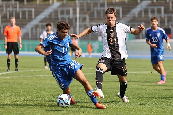 BONN, GERMANY - SEPTEMBER 12: Otto Stange of Germany (R) challenges Giacomo Arduini of Italy (L) during the U17 4-Nations tournament between Germany and Italy at Sportpark Nord on September 12, 2023 in Bonn, Germany. (Photo by Christof Koepsel/Getty Images)