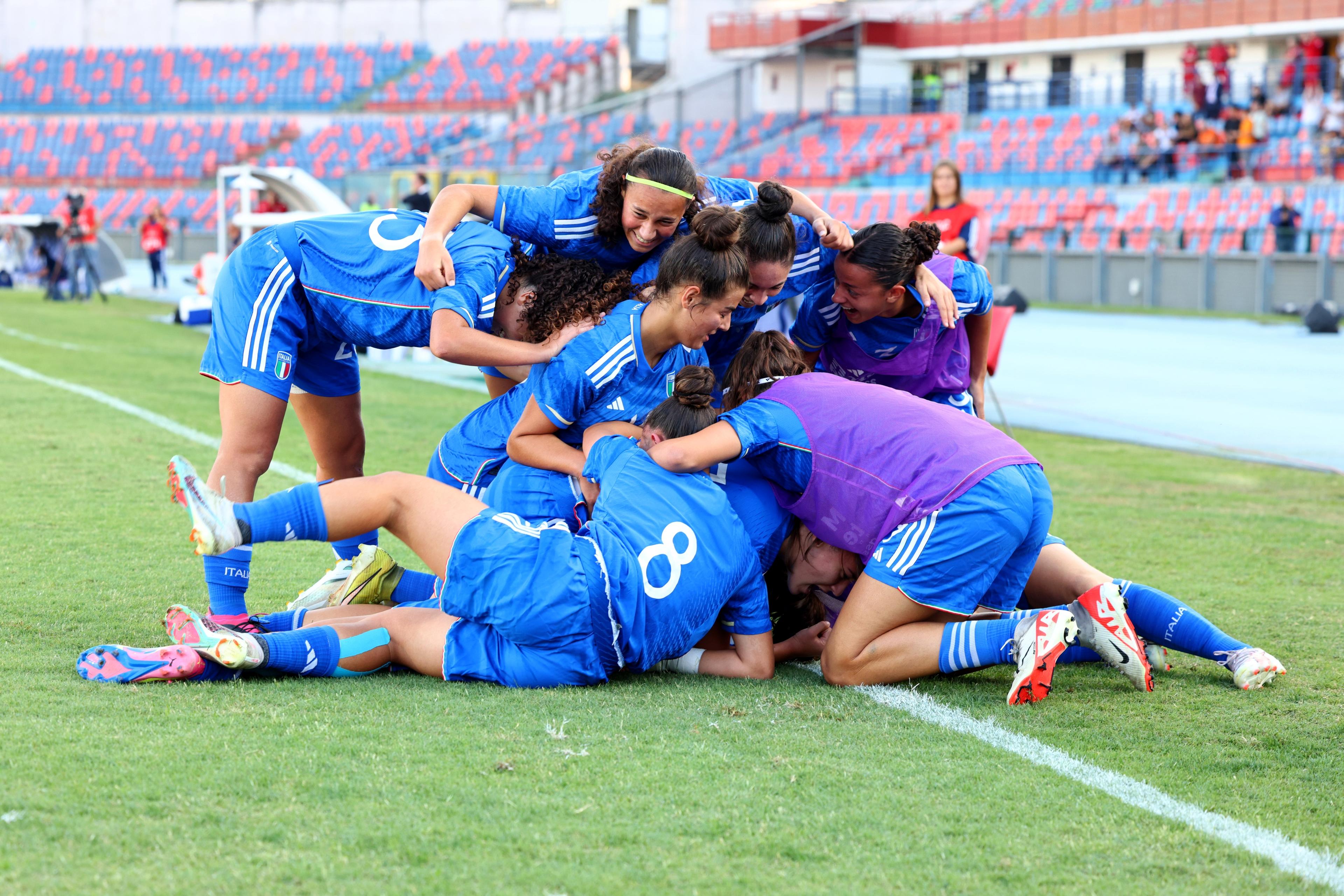 COSENZA, ITALY - OCTOBER 12: Giulia Galli of Italy celebrates with her teammate her team's first goal during the 2023/24 UEFA European Women's Under-17 Championship Round 1 match between Italy and France on October 12, 2023 in Cosenza, Italy. (Photo by Maurizio Lagana/Getty Images)