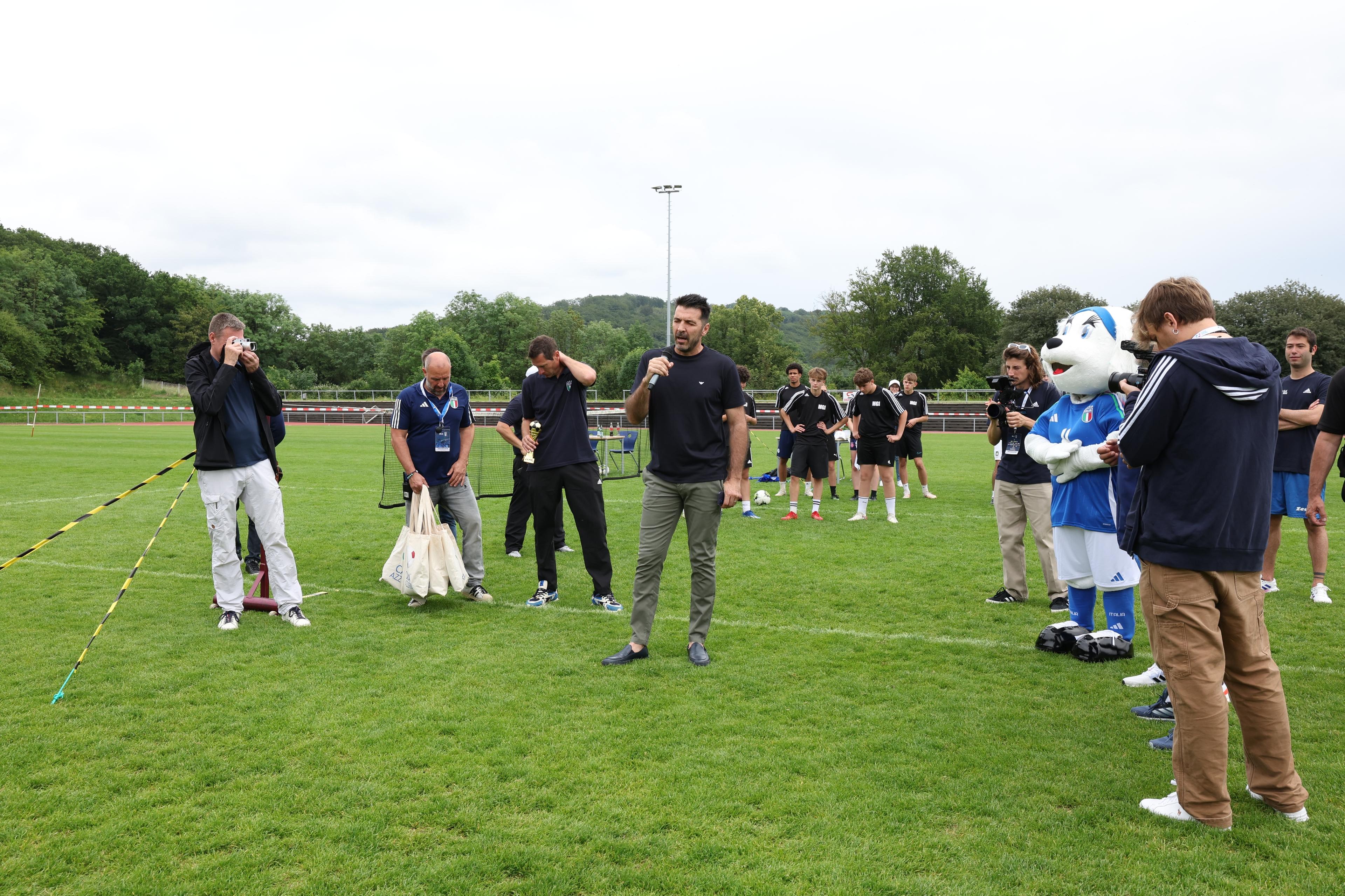 ISERLOHN, GERMANY - JUNE 21: Head Italy delegation Gianluigi Buffon awards prizes at the boys' tournament at Hemberg-Stadion on June 21, 2024 in Iserlohn, Germany. (Photo by Claudio Villa/Getty Images for FIGC)