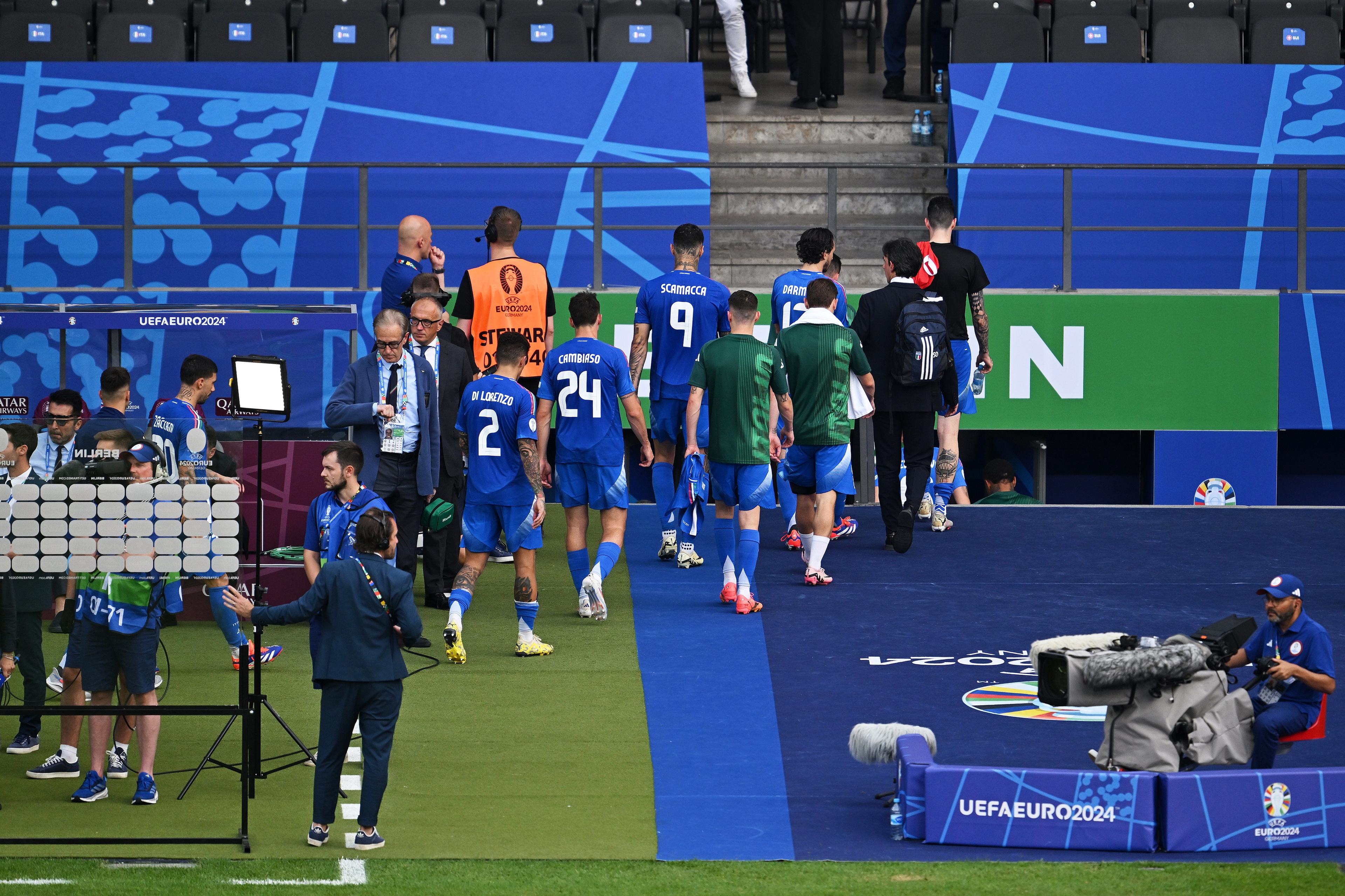 BERLIN, GERMANY - JUNE 29: Players of Italy, walk off the pitch after the team's elimination from the tournament following the UEFA EURO 2024 round of 16 match between Switzerland and Italy at Olympiastadion on June 29, 2024 in Berlin, Germany. (Photo by Tullio Puglia - UEFA/UEFA via Getty Images)