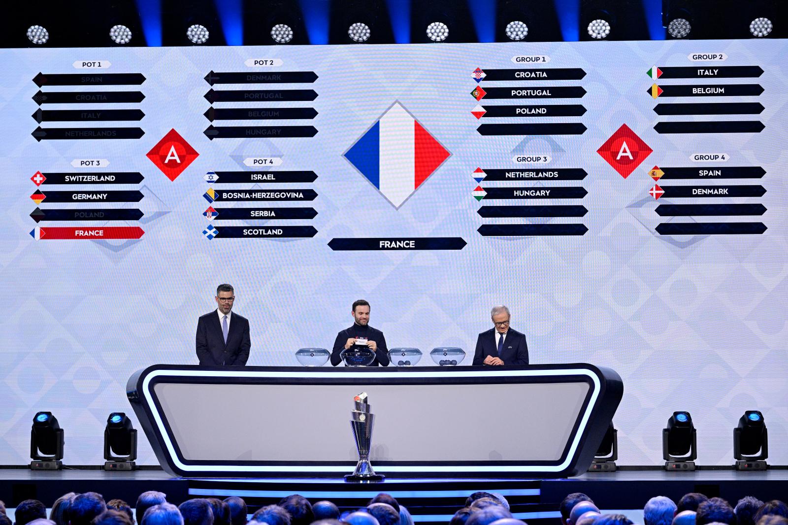 PARIS, FRANCE - FEBRUARY 08: A general view as Former Footballer Juan Mata draws France from the pot during the League A draw as Presenter Pedro Pinto and Giorgio Marchetti, Deputy General Secretary of UEFA, look on during the League D draw during the UEFA Nations League 2024/25 League Phase Draw at Maison De La Mutualite on February 08, 2024 in Paris, France. (Photo by Kristy Sparow - UEFA/UEFA via Getty Images)