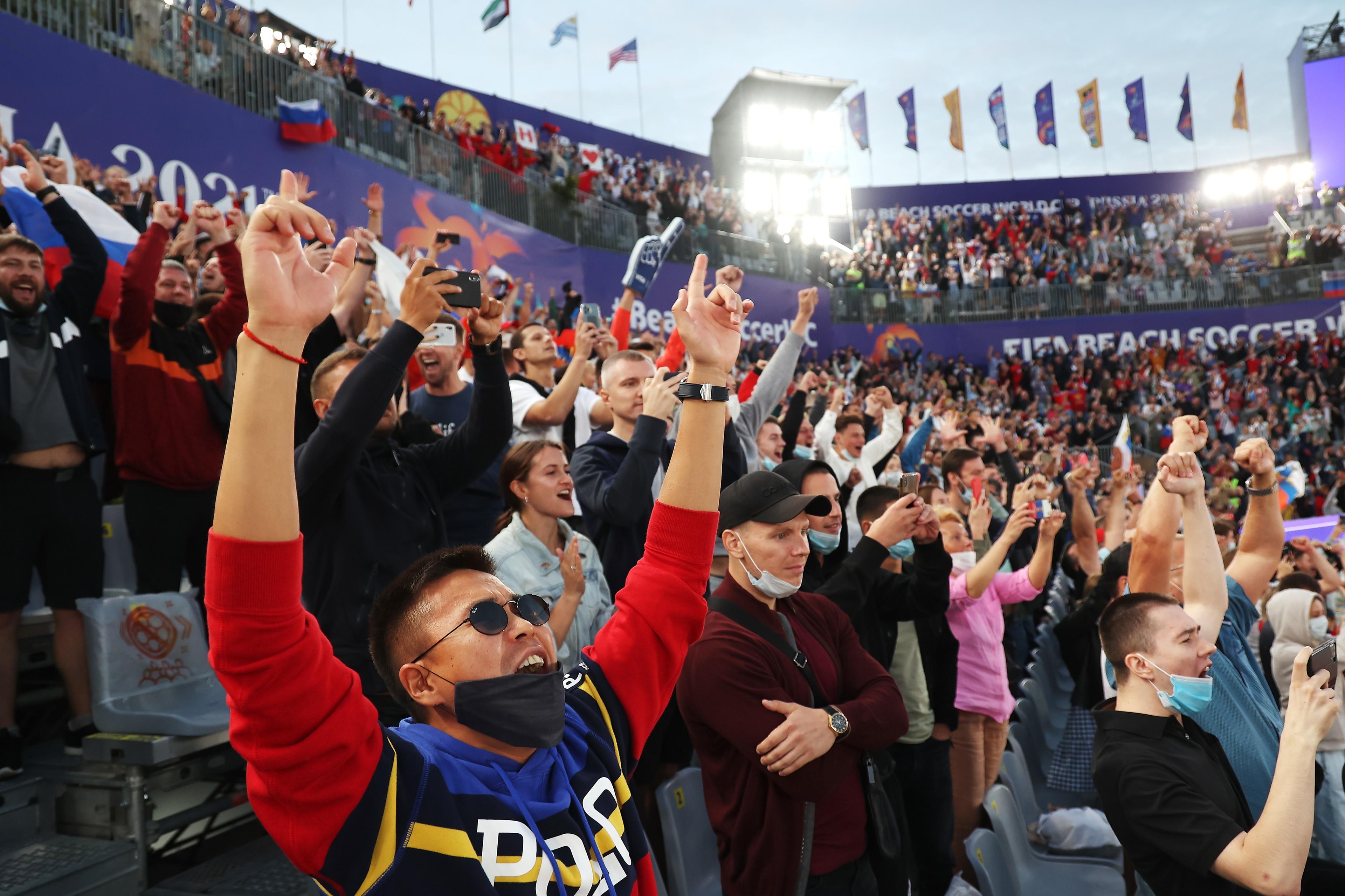 MOSCOW, RUSSIA - AUGUST 28: The fans celebrate a goal during the FIFA Beach Soccer World Cup 2021 Semi Final match between Football Union Of Russia and Switzerland at Luzhniki Beach Soccer Stadium on January 1, 0001 in Moscow, Russia. (Photo by Oleg Nikishin - FIFA/FIFA via Getty Images)