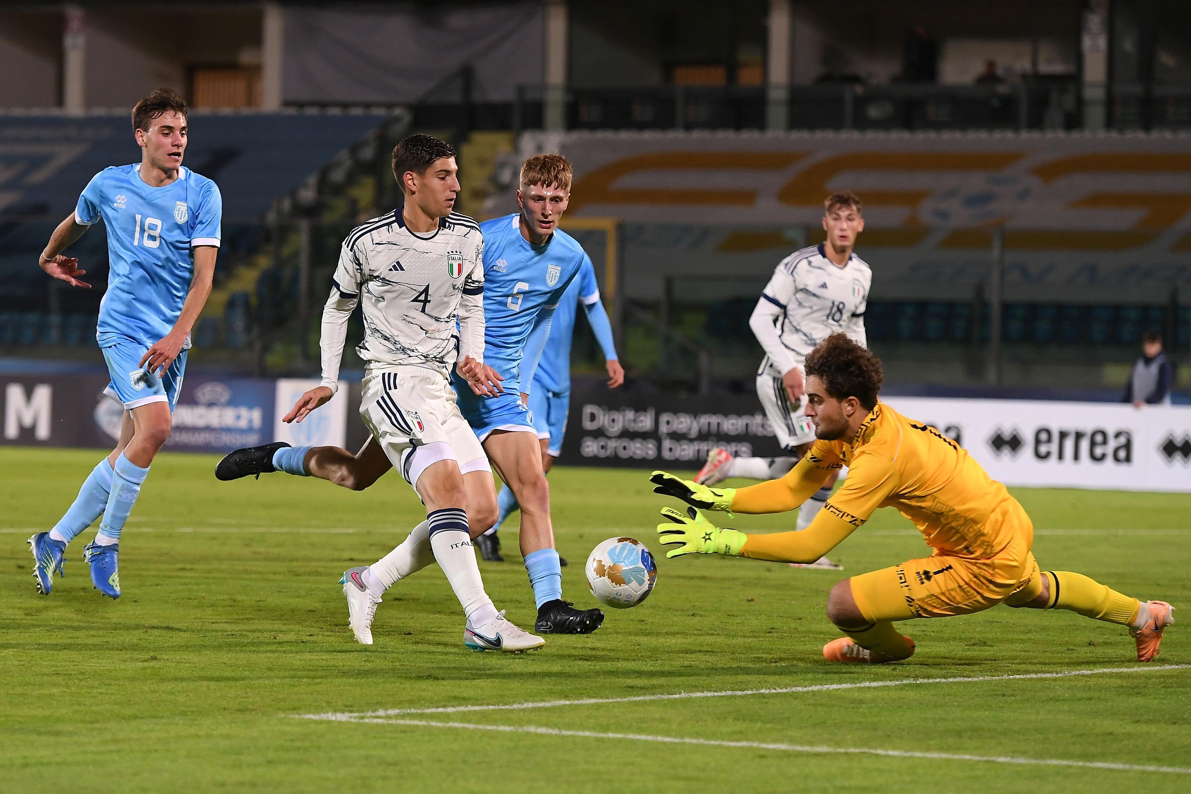 SAN MARINO, ITALY - NOVEMBER 16: Matteo Prati of Italy U21 competes for the ball with Pietro Amici of San Marino during the UEFA Under21 Euro Qualifier match between San Marino U21 and Italy U21 at Serravalle on November 16, 2023 in San Marino, Italy. (Photo by Alessandro Sabattini/Getty Images)