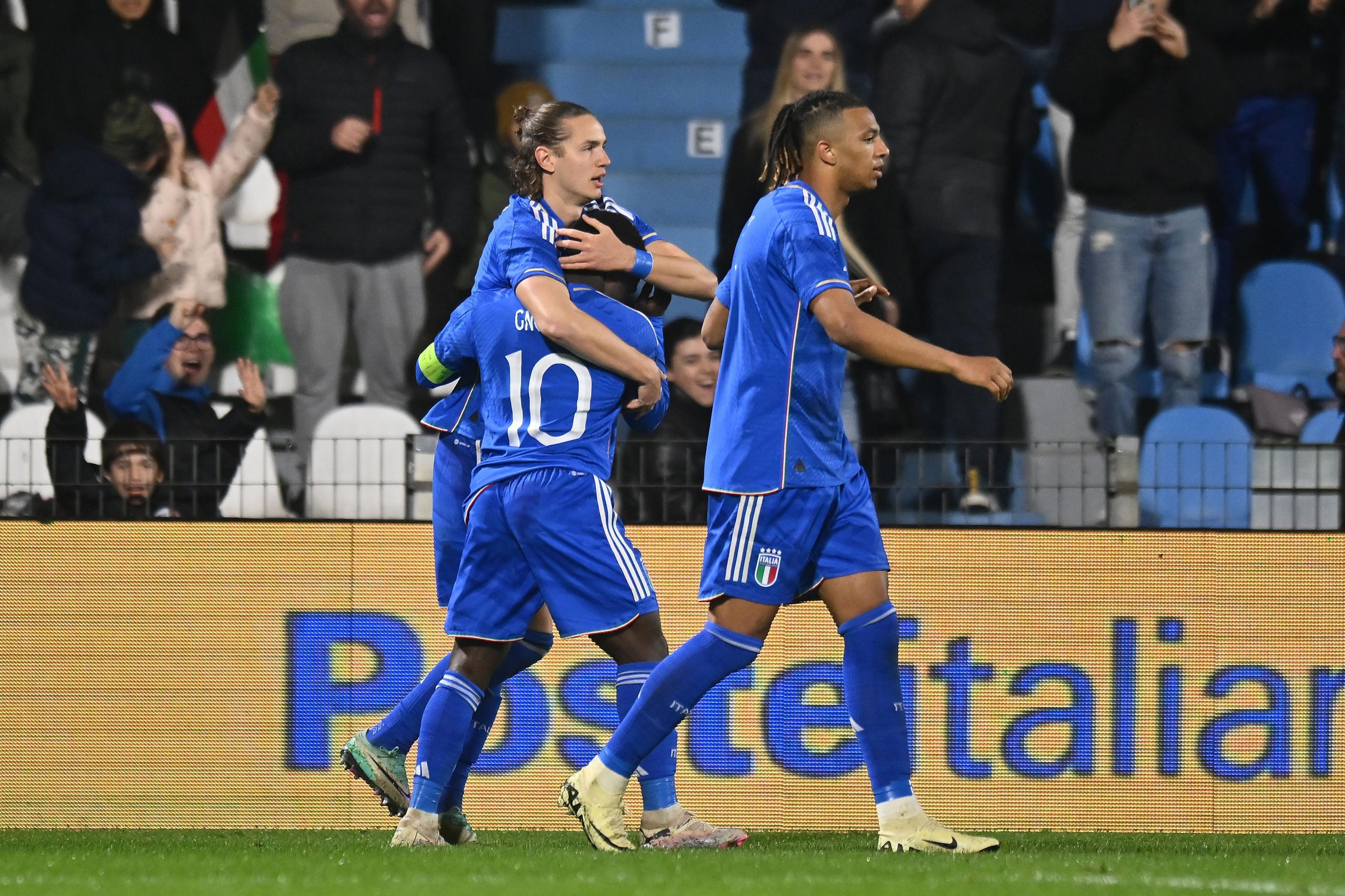 FERRARA, ITALY - MARCH 26: Daniele Ghilardi of Italy U2 Luis Hasa of Italy U21 celebrates after scoring the opening goal with teammates during the UEFA Under21 EURO Qualifier match between Italy U21 and Turkey U21 at Stadio Paolo Mazza on March 26, 2024 in Ferrara, Italy. (Photo by Alessandro Sabattini/Getty Images)