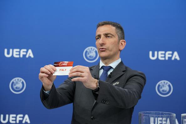 NYON, SWITZERLAND - MAY 3: UEFA Head of Men's National Team Competitions Marcello Alleca draws out the card of Italy during the UEFA European Under-17 Championship 2025 Round 1 Draw at the UEFA Headquarters, the House of the European Football, on May 3, 2024, in Nyon, Switzerland. (Photo by Nemanja Basevic - UEFA/UEFA via Getty Images)