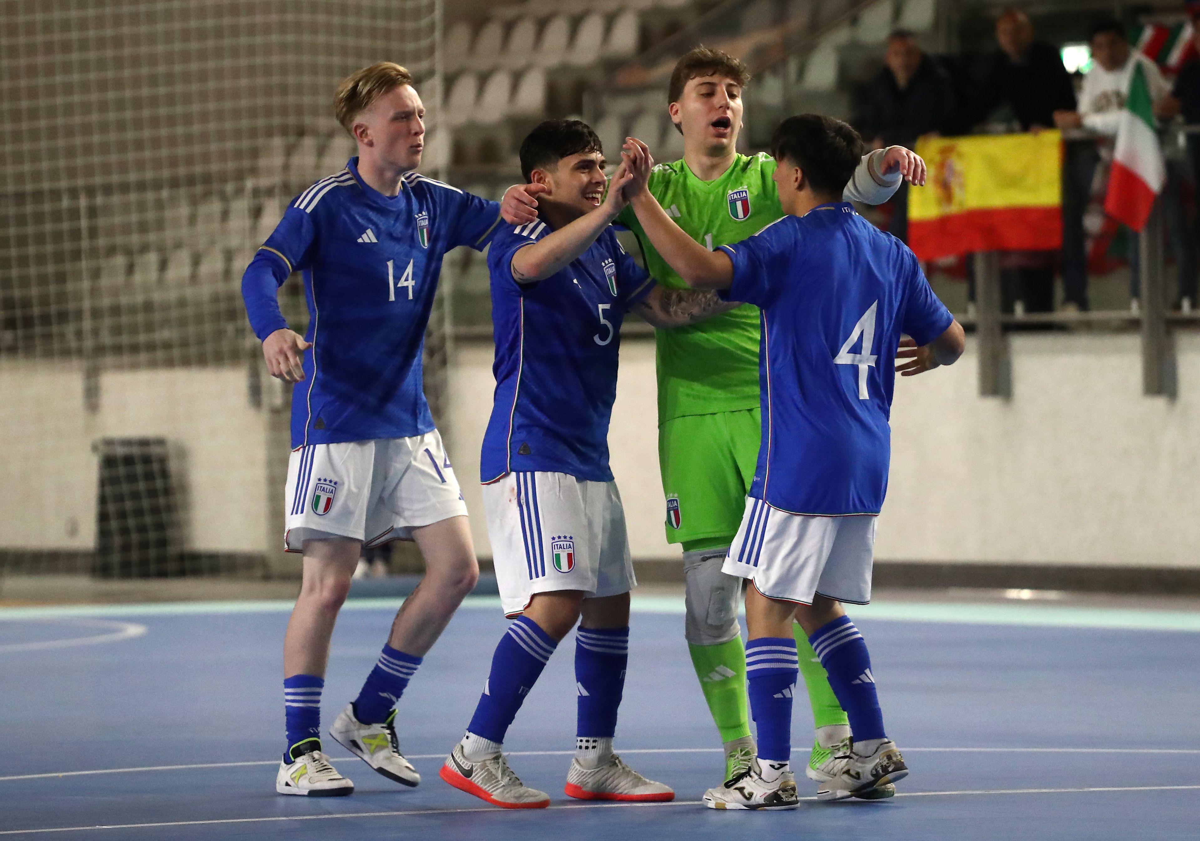 LECCO, ITALY - MAY 07: Giulio Musumeci of Italy celebrates his goal with his team-mates during the U19 Futsal International Friendly between Italy U19 and Spain U19 at PalaTaurus on May 07, 2024 in Lecco, Italy. (Photo by Marco Luzzani/Getty Images)