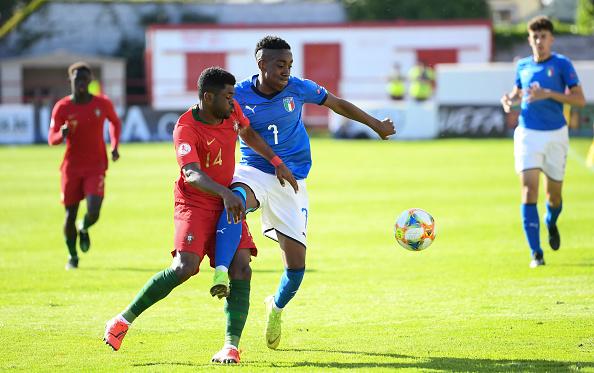 Dublin , Ireland - 13 May 2019; Franco Tongya of Italy in action against Filipe Cruz of Portugal during the 2019 UEFA European Under-17 Championships quarter-final match between Italy and Portugal at Tolka Park in Dublin. (Photo By Stephen McCarthy/Sportsfile via Getty Images)