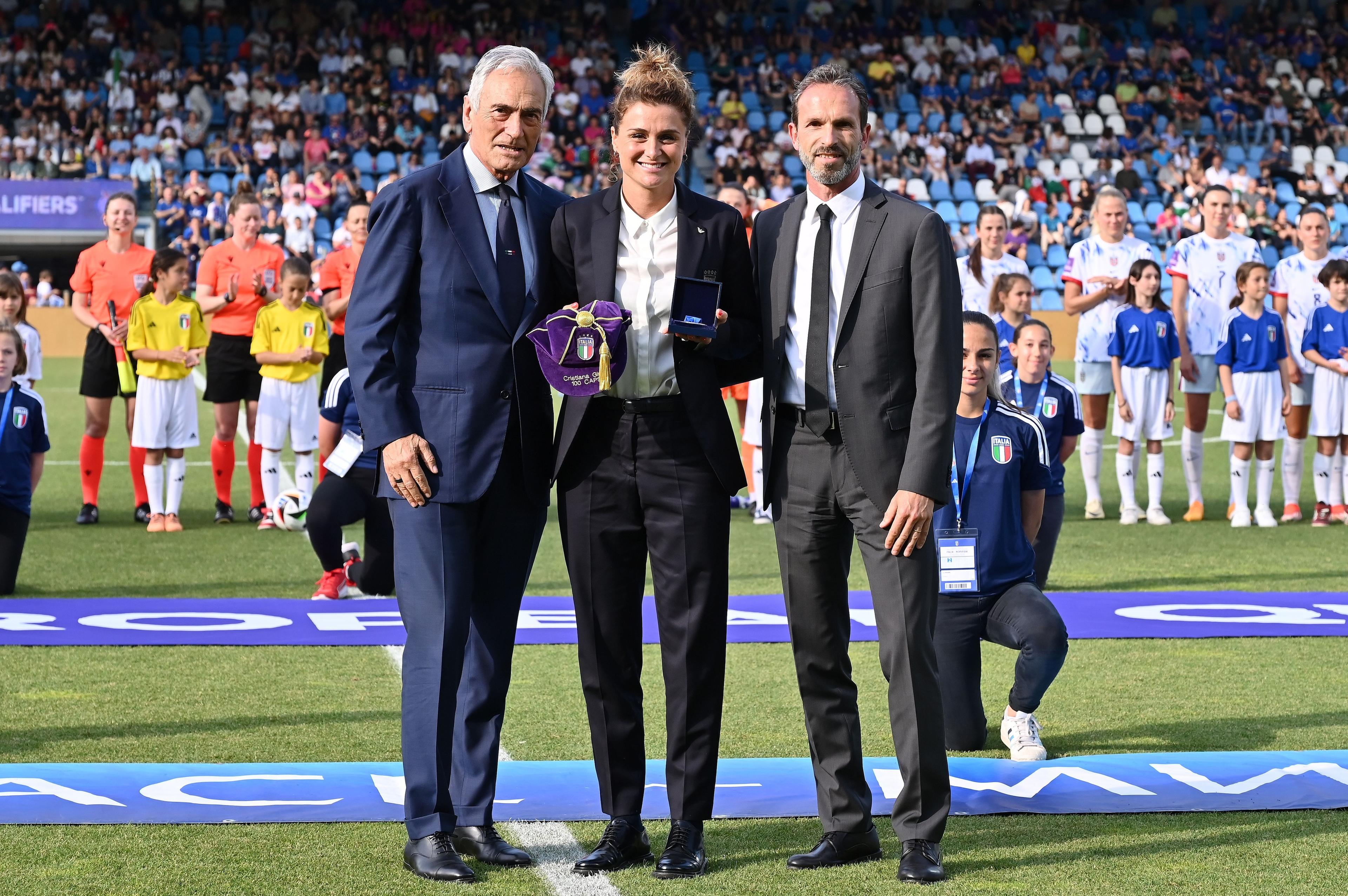 FERRARA, ITALY - JUNE 04:Gabriele Gravina and Umberto Calcagno reward Cristiana Girelli of Italy during the UEFA Women's EURO 2025 Qualifier match between Italy and Norway at Stadio Paolo Mazza on June 04, 2024 in Ferrara, Italy. (Photo by Alessandro Sabattini/Getty Images)
