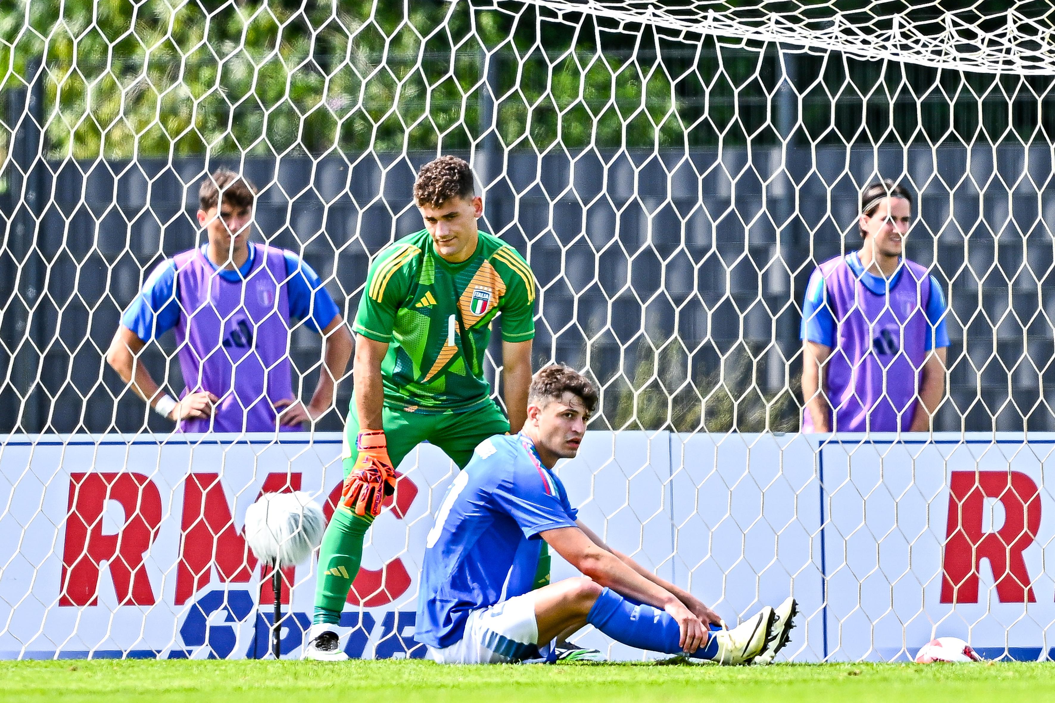AUBAGNE, FRANCE - JUNE 6: Gioele Zacchi (left) and Giovanni Bonfanti of Italy U21 react with disappointment after Danylo Sikan of Ukraine U21Õs goal during the 50th Tournoi Maurice Revello match between Ukraine U21 and Italy U21 at Stade de Lattre on June 6, 2024 in Aubagne, France. (Photo by Simone Arveda/Getty Images)